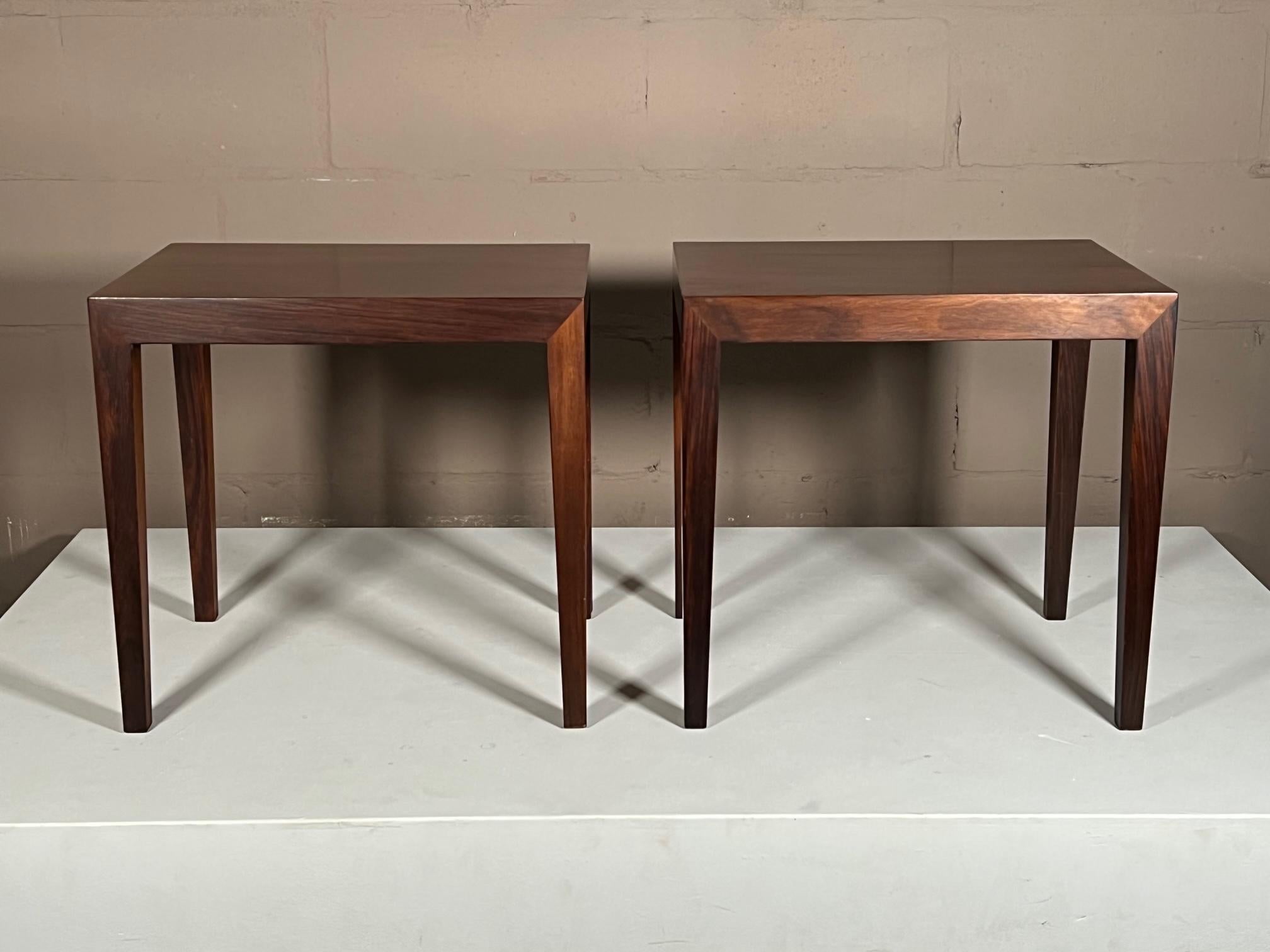 Fantastic pair of side or pedestal tables by Severin Hansen, produced in Denmark in the 1960's. Very elegant simple forms with tapering legs and mitered corners, these tables have a strong presence and architectural feel. This pair has a rich patina