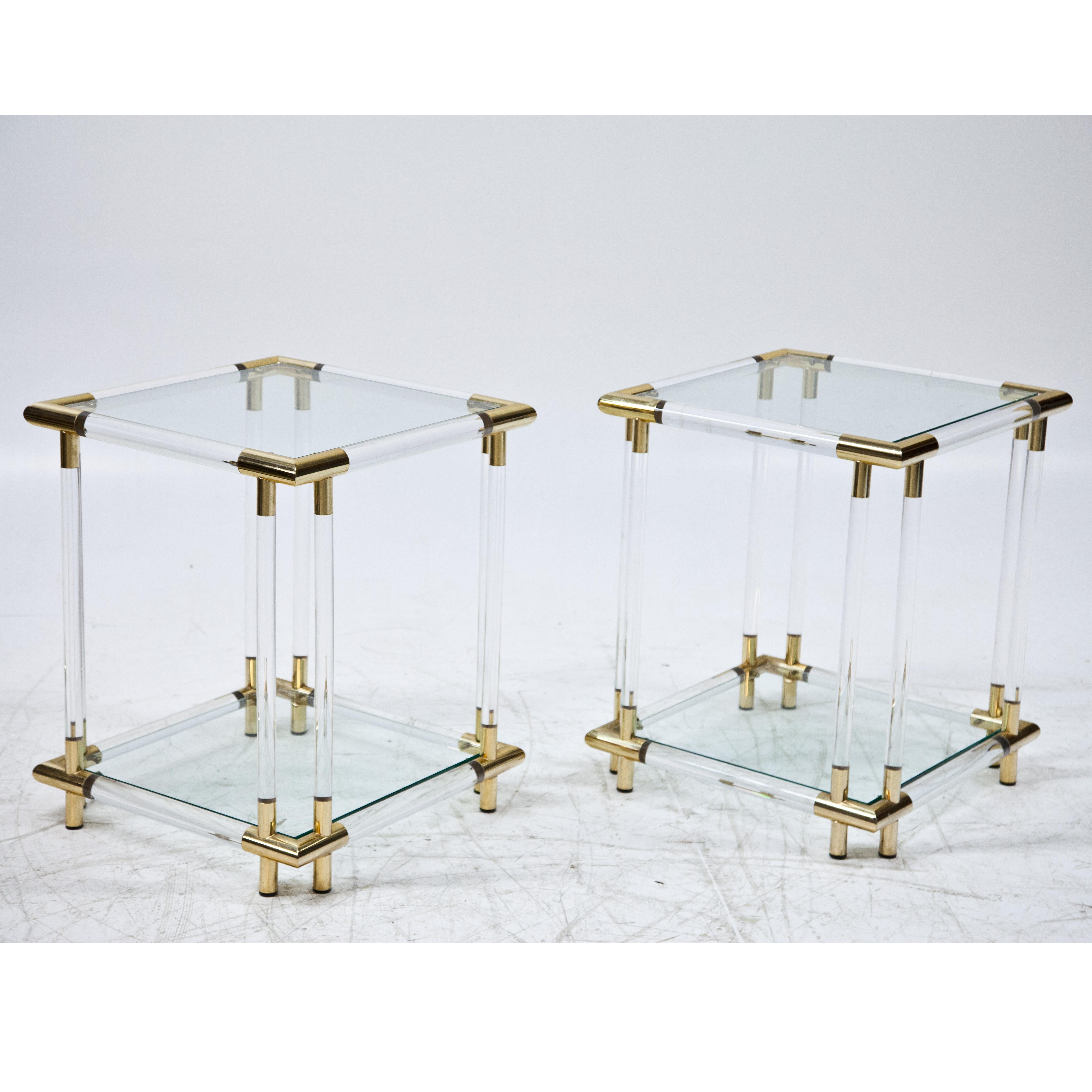 Pair of side tables Lucite and glass with brass accents.