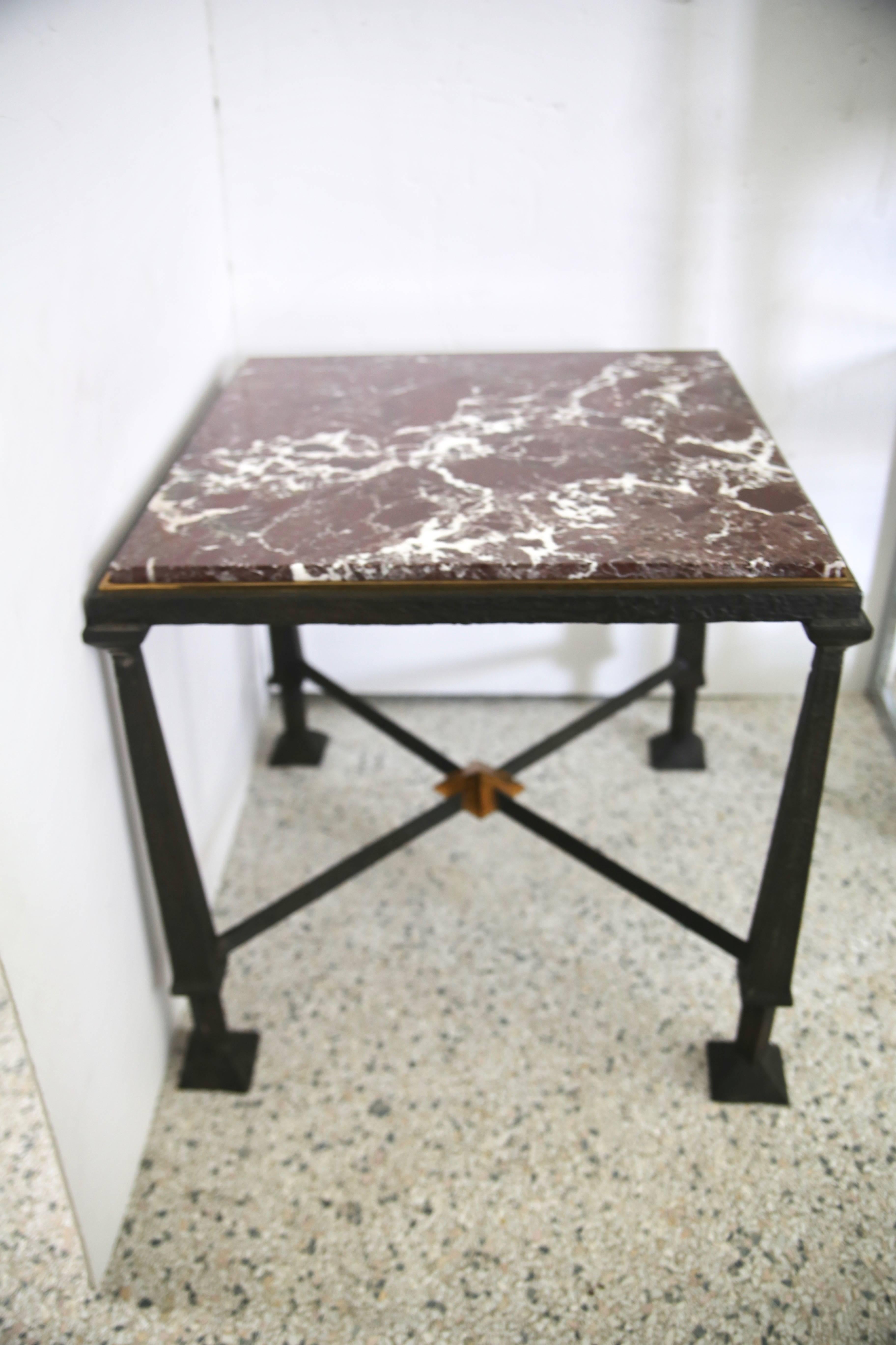 This stylish and substantial pair of bronze and marble side tables are attributed to Frank Lloyd Wright and were acquired from a Palm Beach estate.


    
