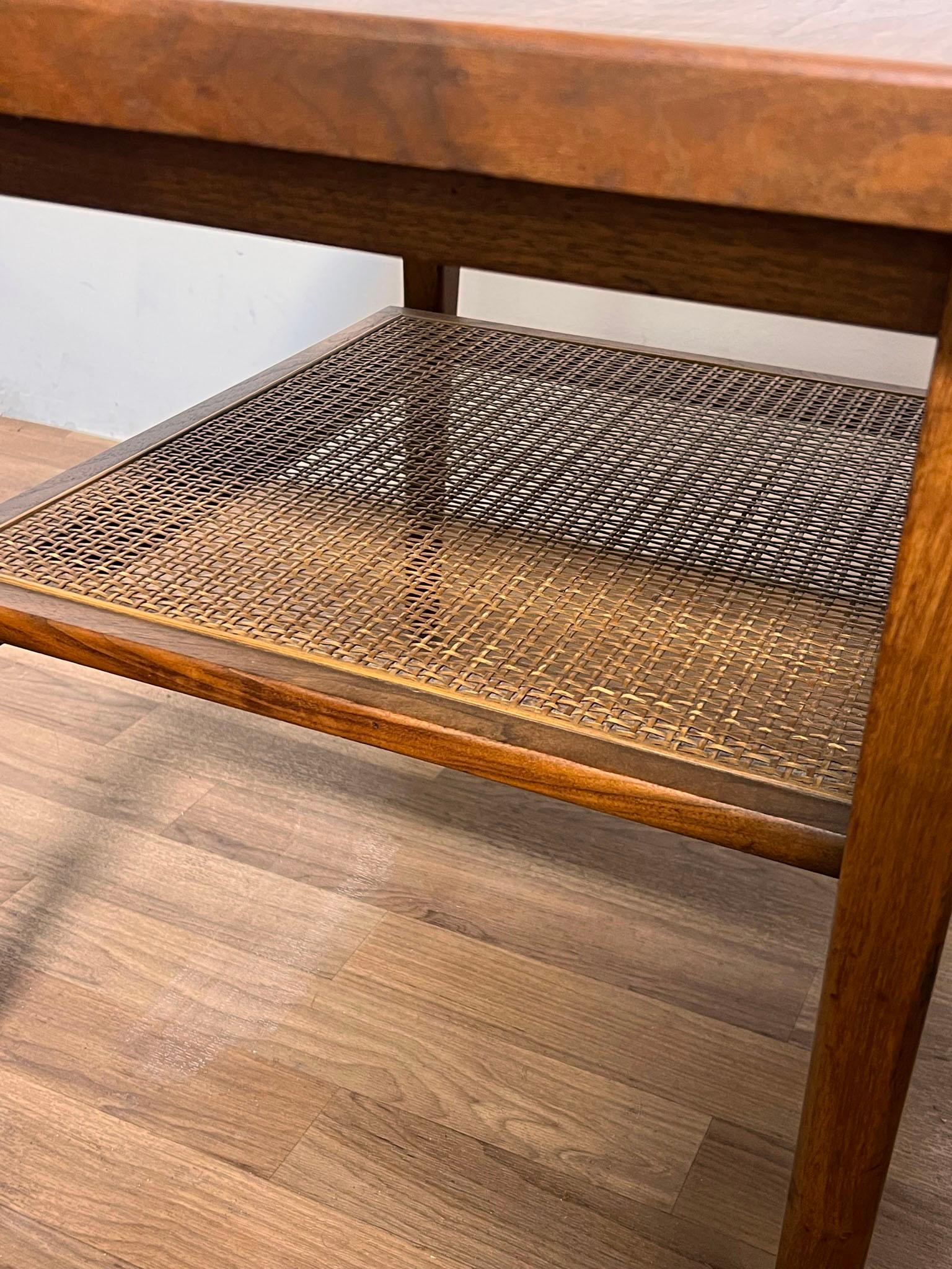 Mid-20th Century Pair of Side Tables in Walnut with Cane Undershelves by Kipp Stewart for Drexel