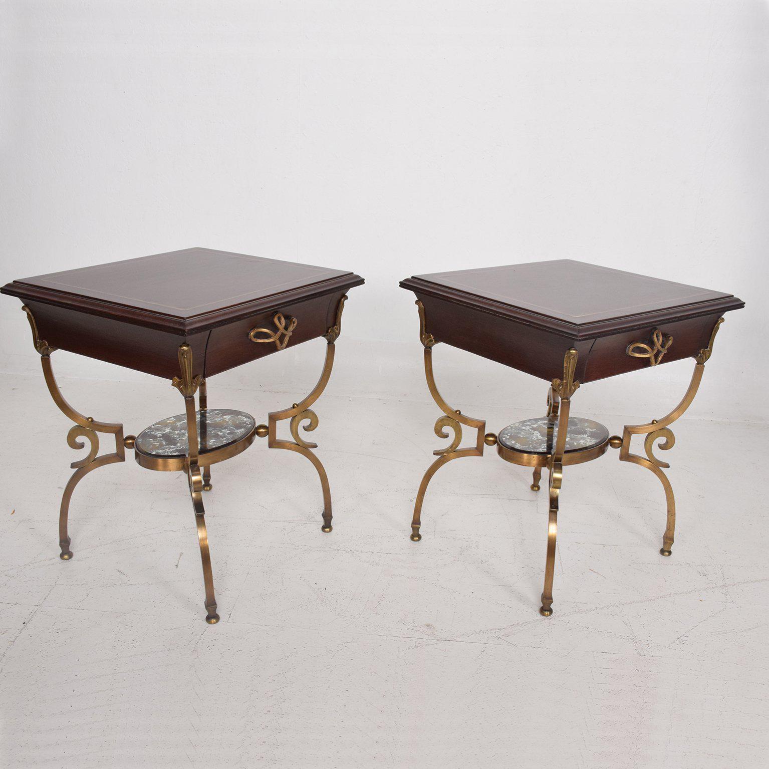For your consideration a vintage pair of side tables or nightstands attributed to Arturo Pani.
Solid bronze legs/frame construction. Sculptural shape with eglomized oval mirror in the centre. The top has an original glass to protect the top.
The
