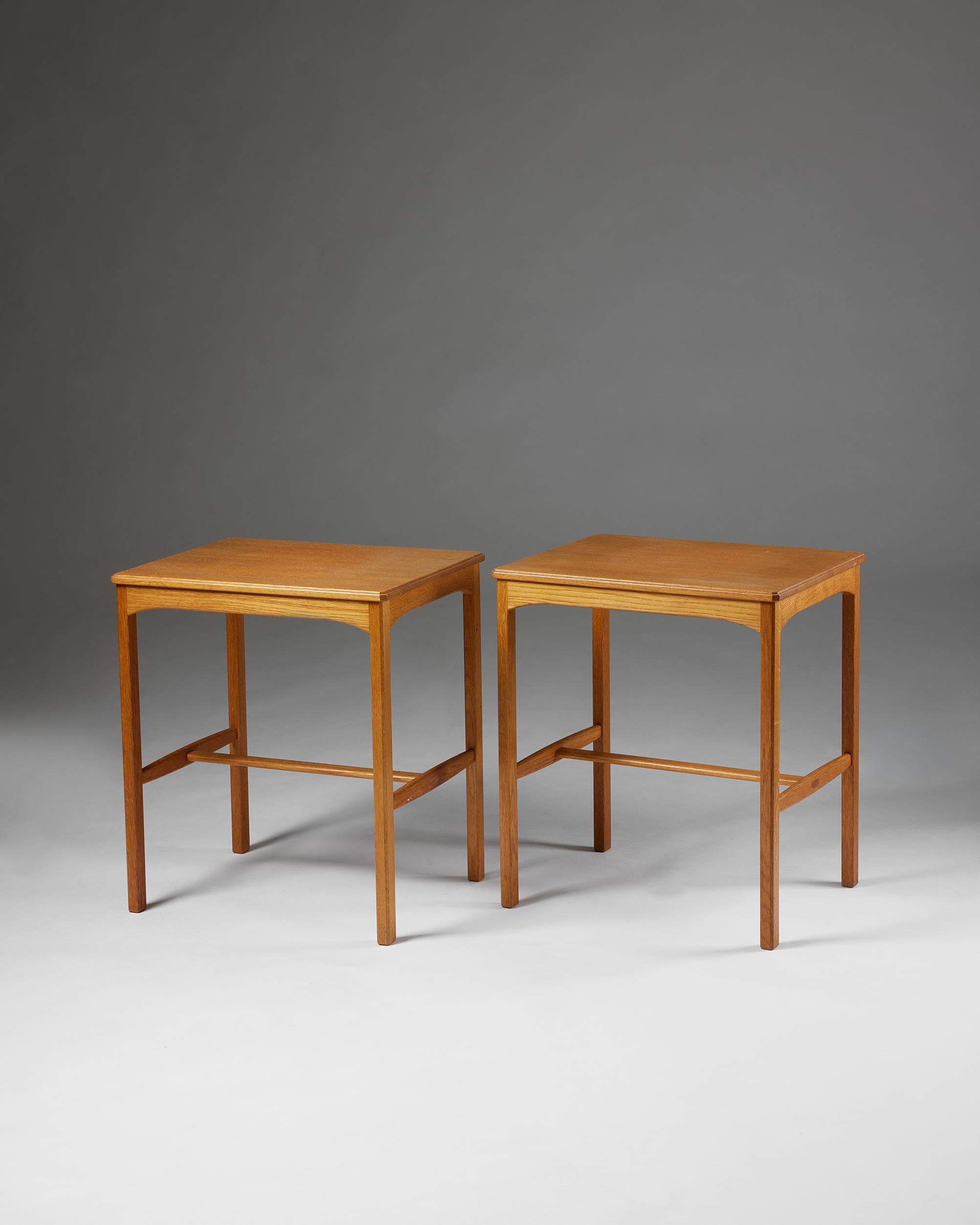  Pair of side tables ‘October’ designed by Carl Malmsten for Carl Löving & Sons,
Sweden, 1950s.

Oak.