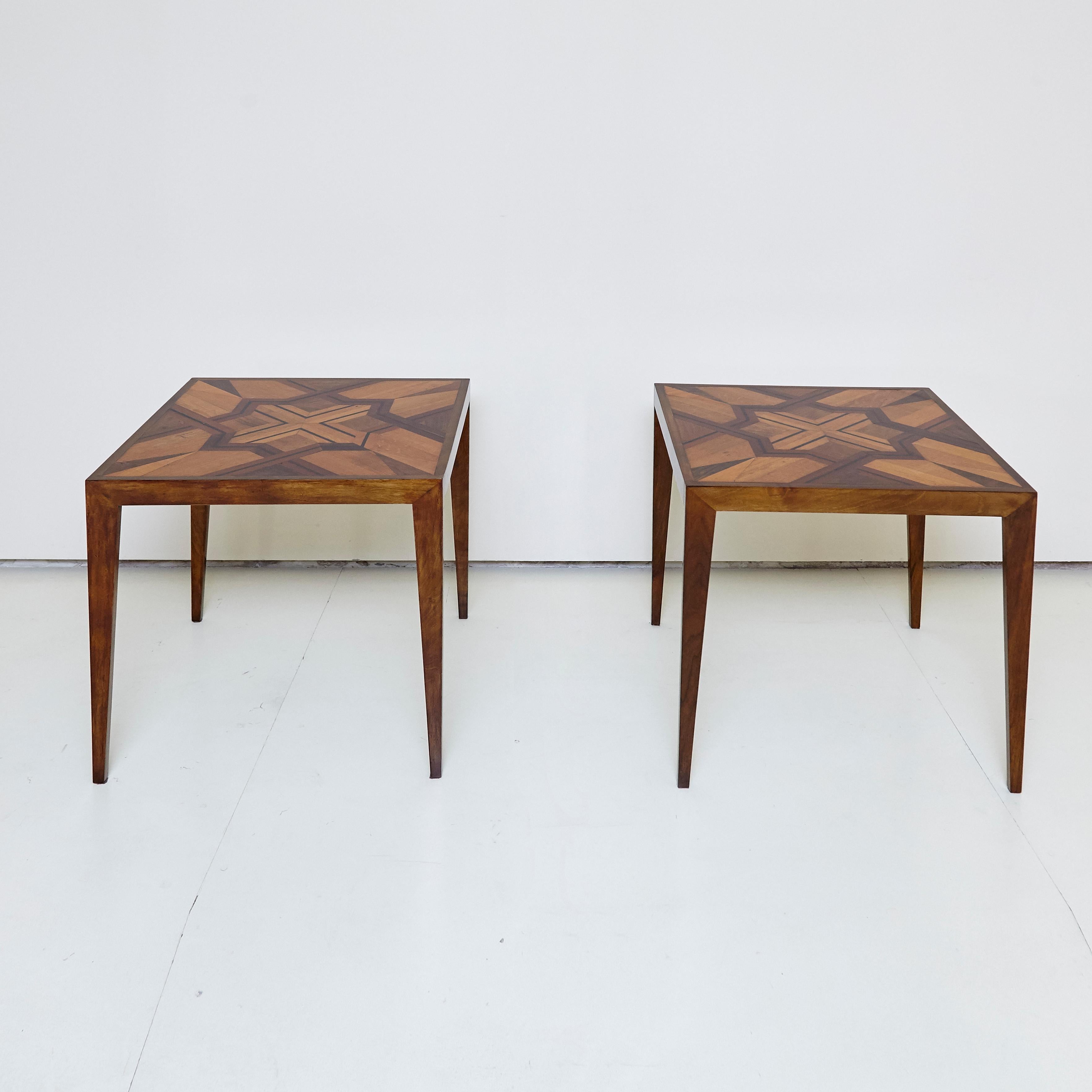 Pair of side tables of various noble woods mad in Barcelona by Anonymous.

Measures: 53 x 53 x 57 cm.

There is the possibility of making it in different measures.