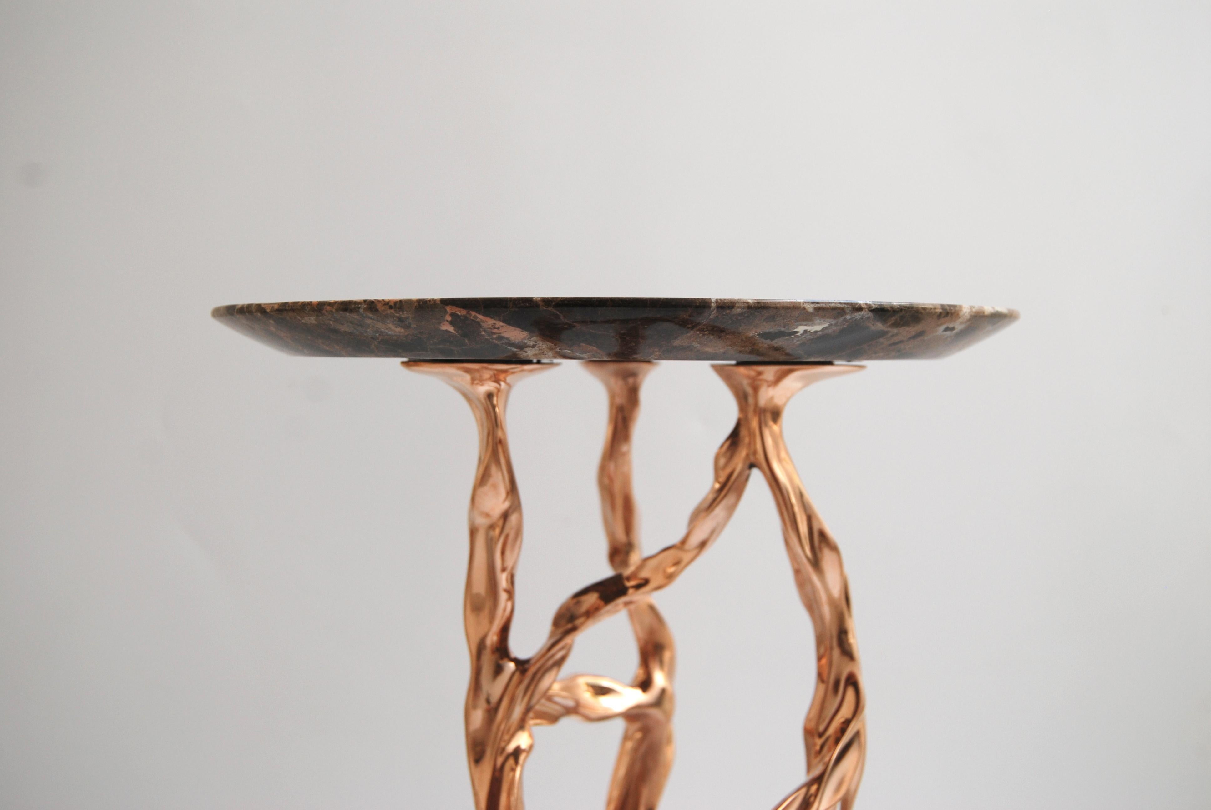 Pair of polished bronze side tables with marquina marble top by Fakasaka Design
Dimensions: W 28 x D 28 x H 62 cm
Materials: Polished bronze, nero marquina marble top.

