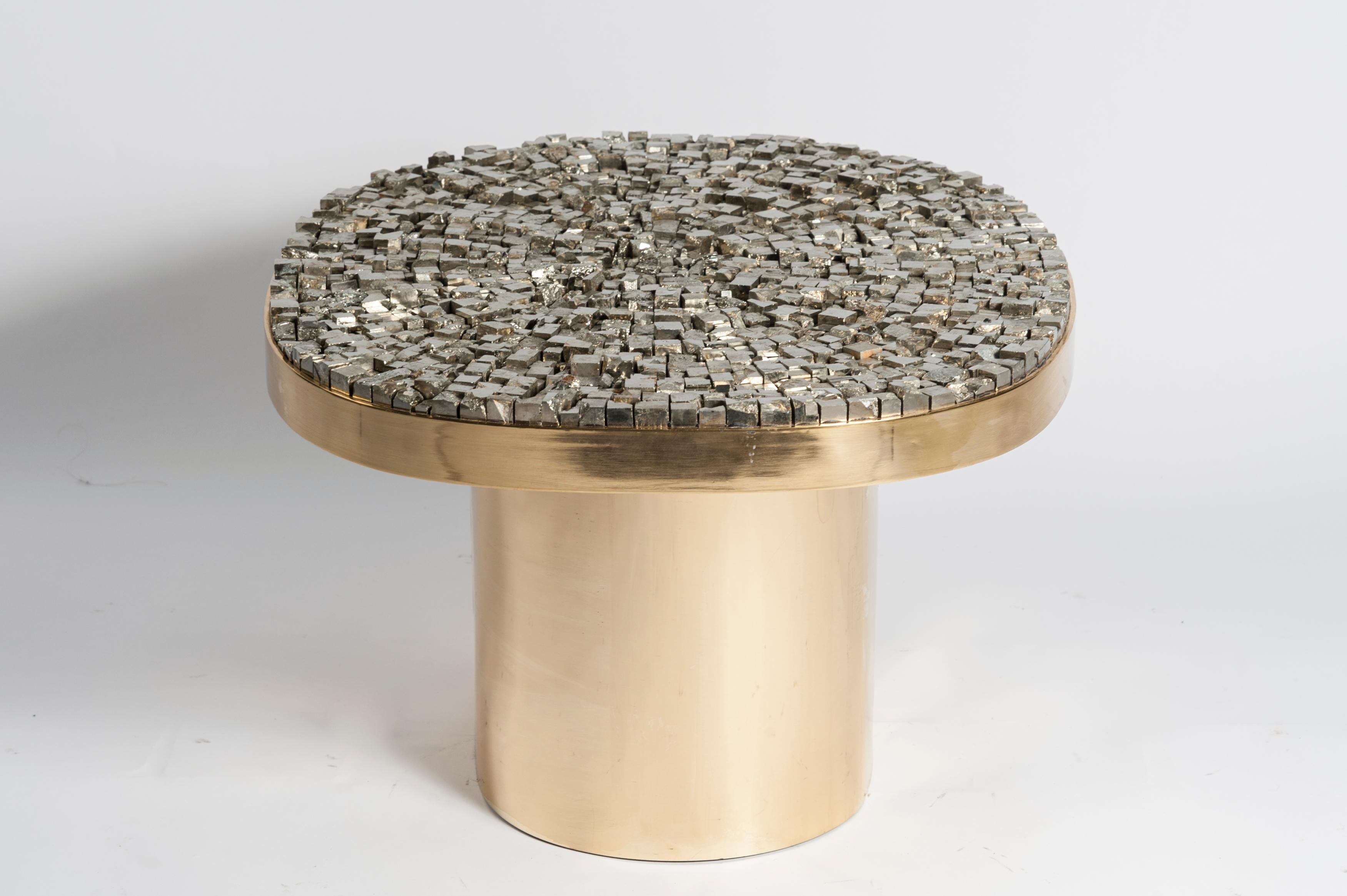 One of a kind side tables with brass base and pyrites stones top
Signed.
 