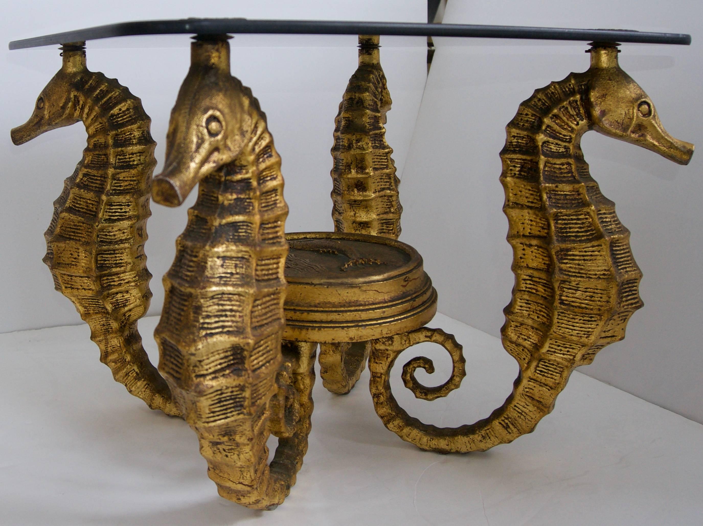 This stylish pair of tables were recently acquired from a Palm Beach estate and are very much in the Art Deco style of the 1920s and 1930s. And very easily could have been found on the Ile de France. The seahorse form is graceful and whimsical and