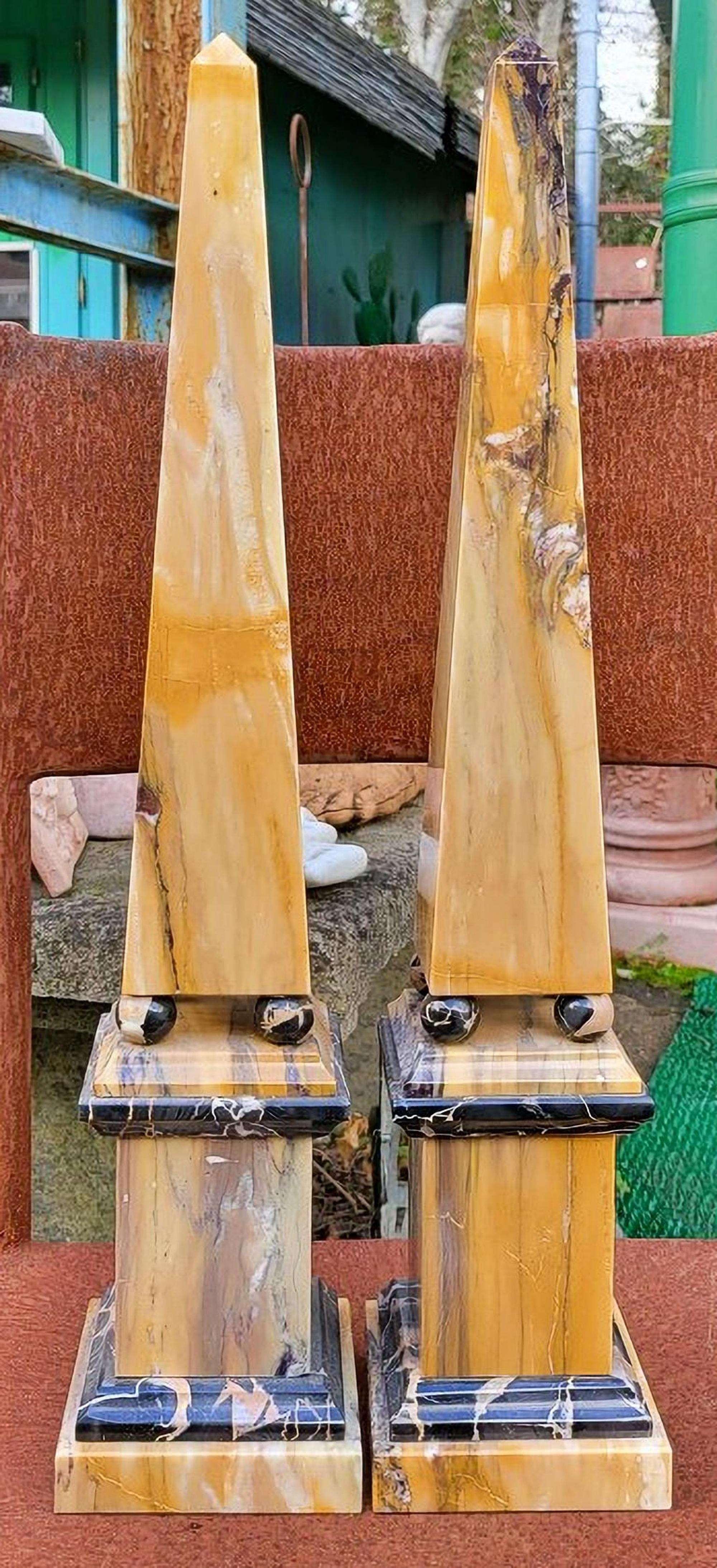 Pair of Siena and Portoro marble yellow obelisks
Beginning 20th century
Measure: height 56 cm
Weight 5 + 5 kg
Square base - side x side 10.5 x 10.5 cm
Manufacture Tuscany Pietrasanta (Lucca)
Material yellow Siena and Portoro marble.