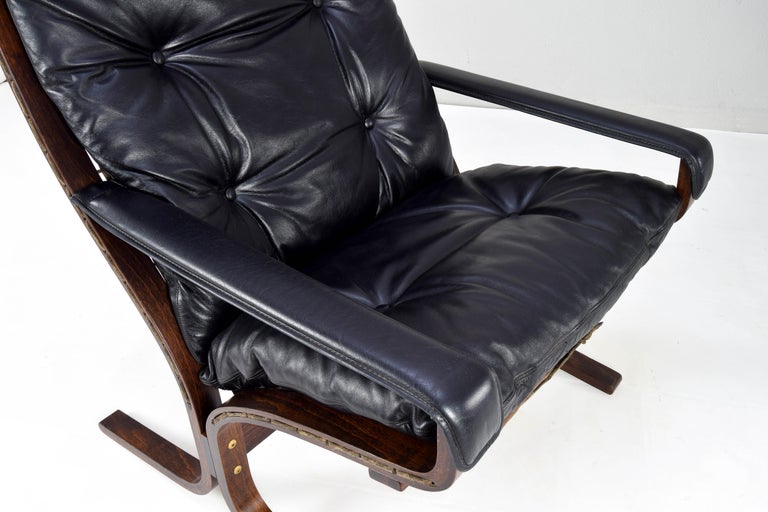 Pair of Siesta Leather Chairs and one Ottoman by Ingmar Relling for Westnofa 5
