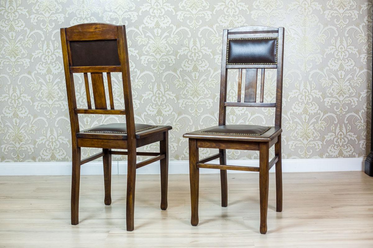 Pair of Early-20th Century Signed Art Nouveau Oak Chairs in Dark Brown Leather

We present you two chairs made of oakwood, circa first quarter of the 20th century. 
The seat and the upper section of the backrest are padded with leather, which is
