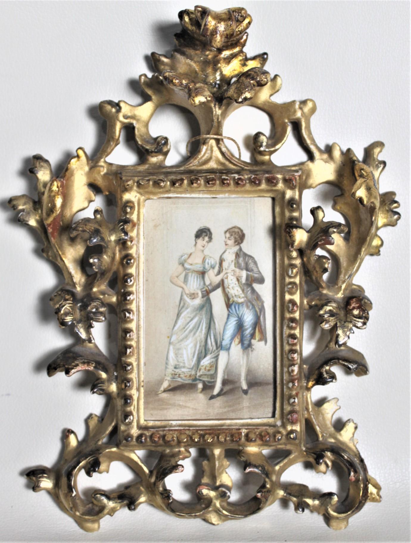 This pair of antique watercolor paintings are done by an unknown artist, likely from France or Italy in circa 1880 in a Renaissance style. The paintings each depict a couple in a ballroom setting dressed in period Renaissance costumes. The paintings