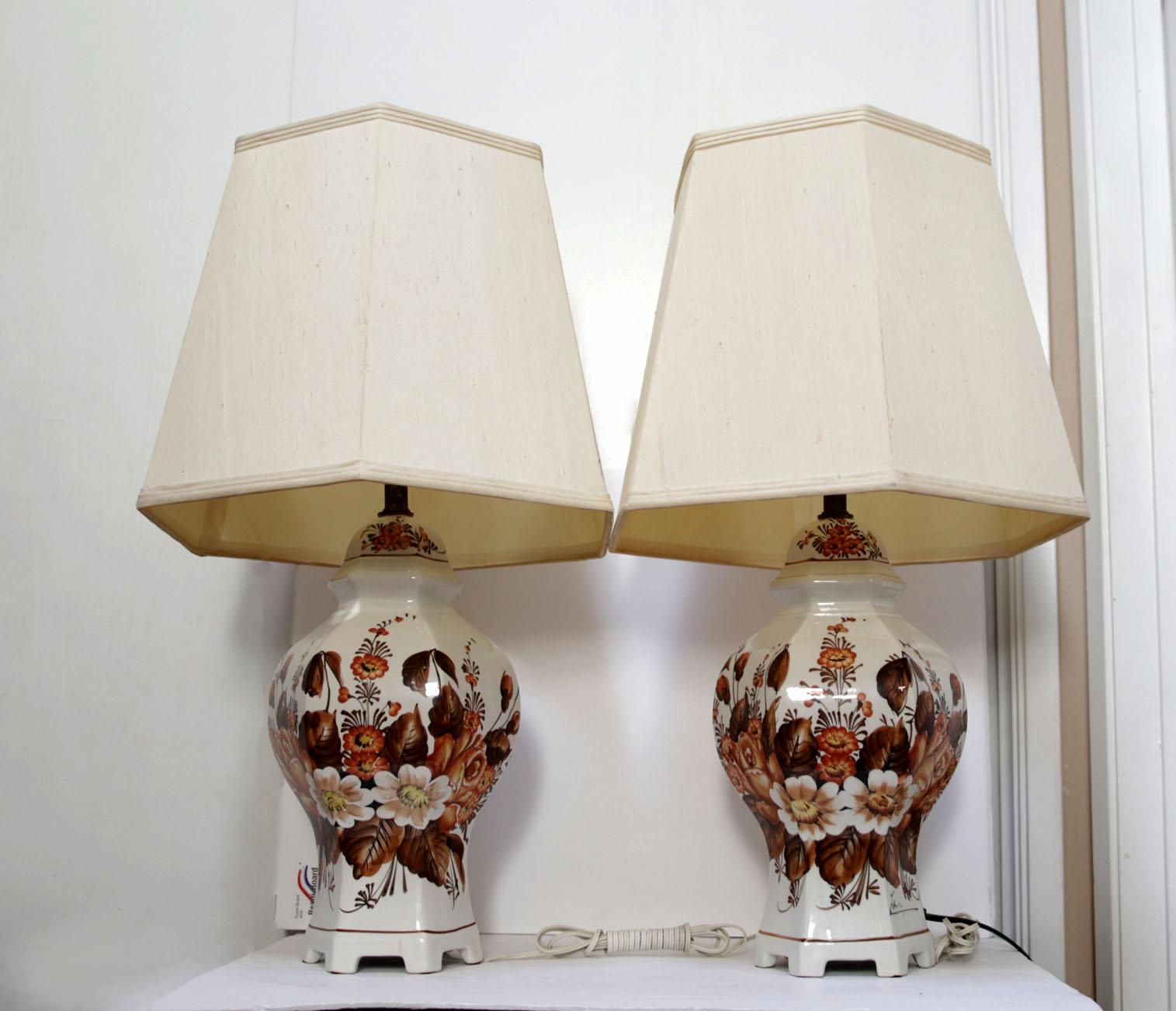 This lamps are from the Northern Italian center for ceramics, Ancora. .A pair of vintage Italian hand-painted porcelain hexagonal table lamps are
decorated and signed by the artist, Antonio Zen, Made in Ancora, Italy, 1940-1960. Lamps are oversized