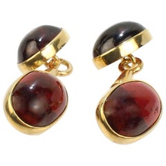 Antique Pair of Austrian Art Deco 14 Karat Gold and Garnet Cabochon Cufflinks