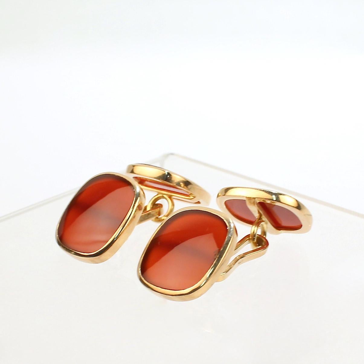 A very fine pair of Edwardian period Austrian cufflinks.

In 14k gold with flat carnelian panels.

Marked G.P. likely for Chaja Paltzew.

An exciting pair of Edwardian period cufflinks!

Date: 20th Century

Overall Condition:
They are in overall
