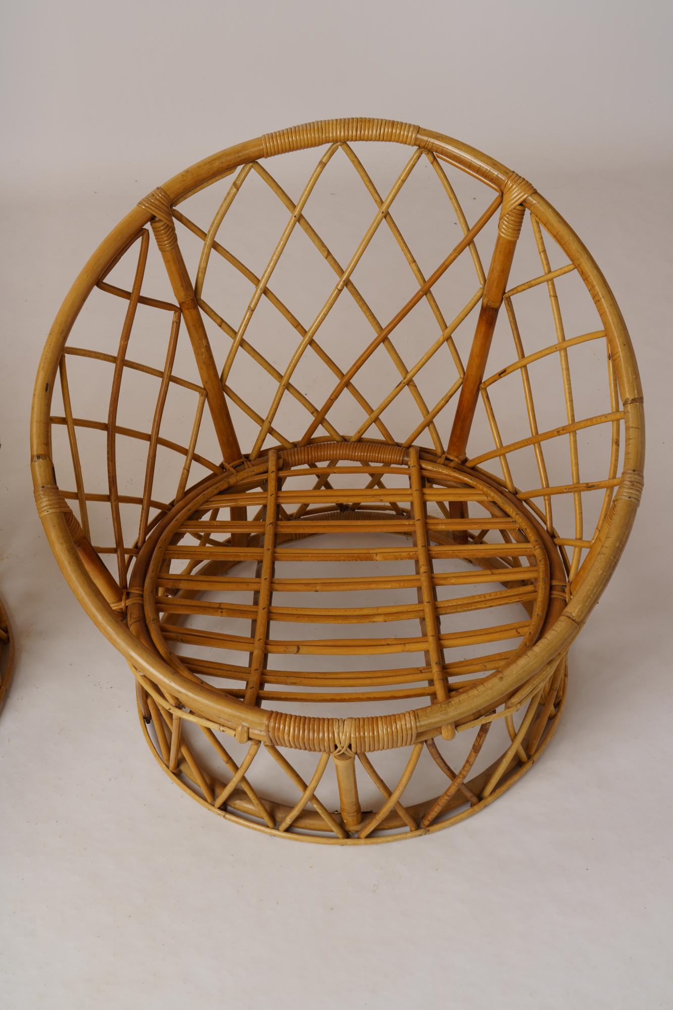 Coppia di lettini in rattan a cesto firmati 