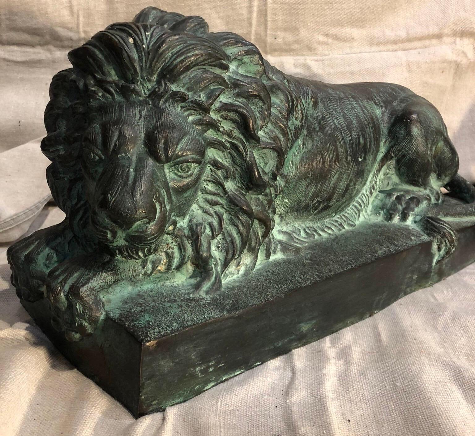 Great pair of bronze recumbent lions with nice patina.

Grand Tour copies with 