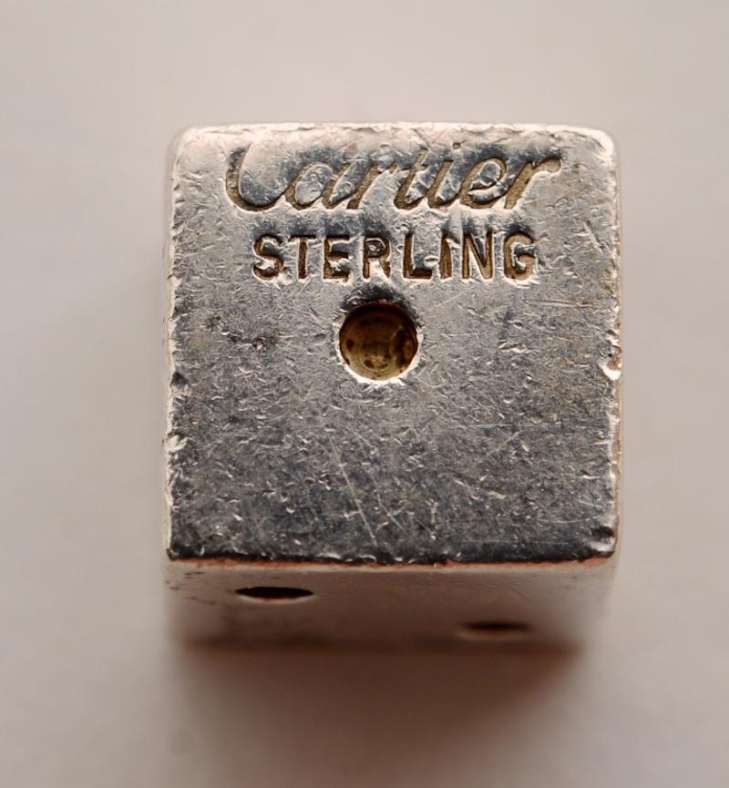 Pair of Signed Cartier Solid Sterling Silver Dice. The .925 sterling silver dice set features 2 die made in solid sterling silver, each signed 