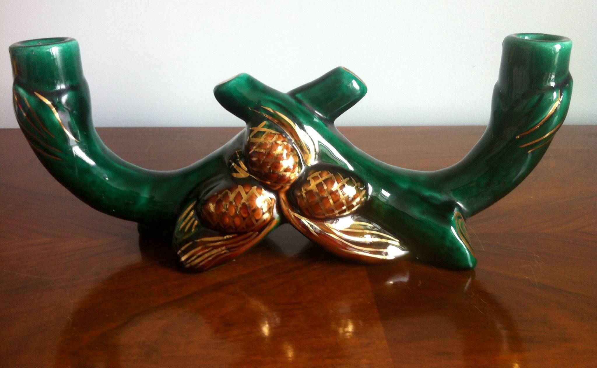 Two pairs of double original Vallauris French midcentury ceramic double candleholders beautifully decorated in a deep green and gold colors ornaments and golden pine nuts.

Signed RB, France.