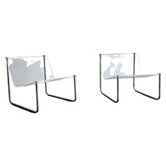 Pair of signed clear lucite and chrome sling chairs by Charles Hollis Jones