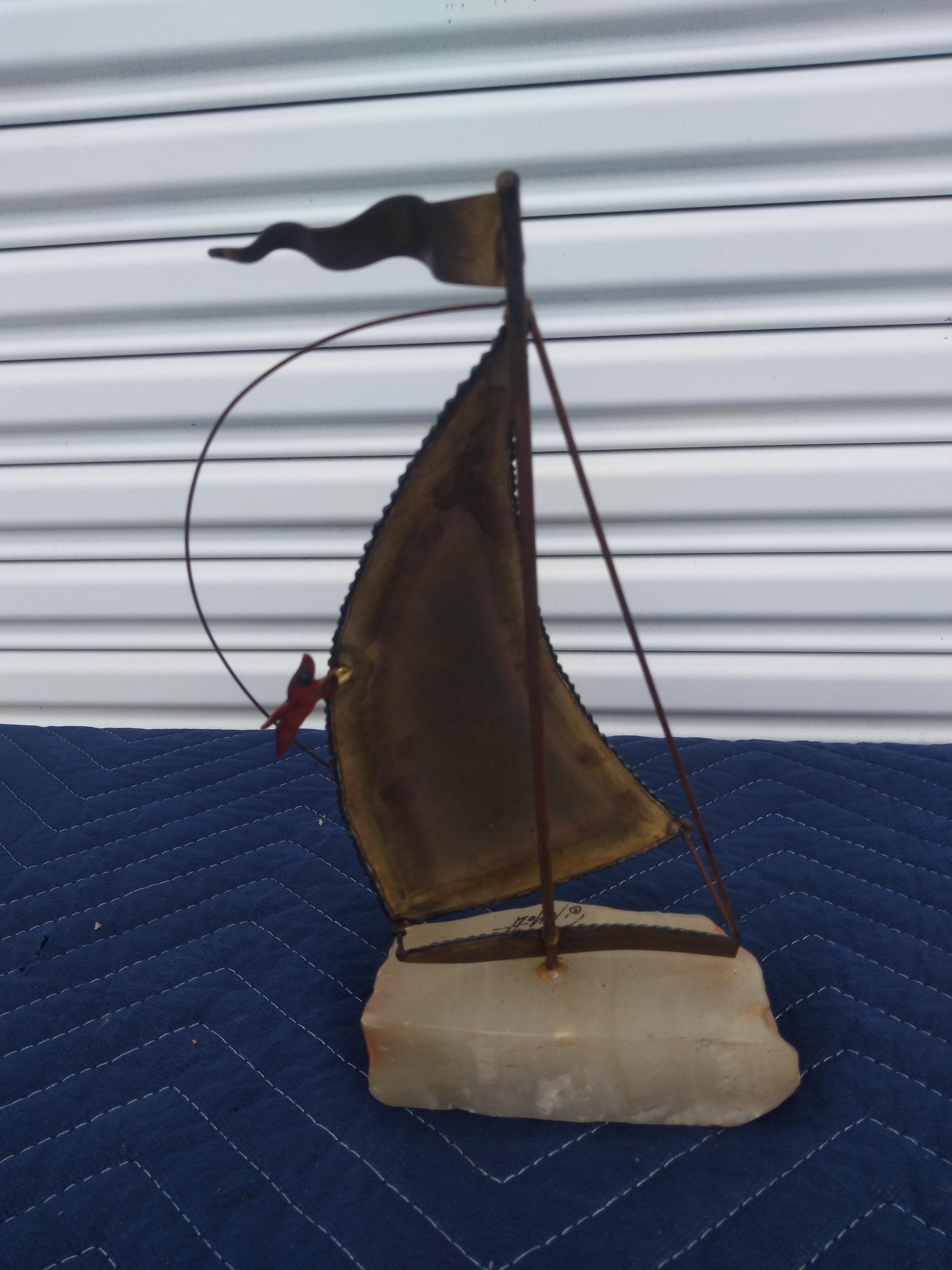 Pareja de esculturas de velero firmadas por DeMott siglo XX en venta