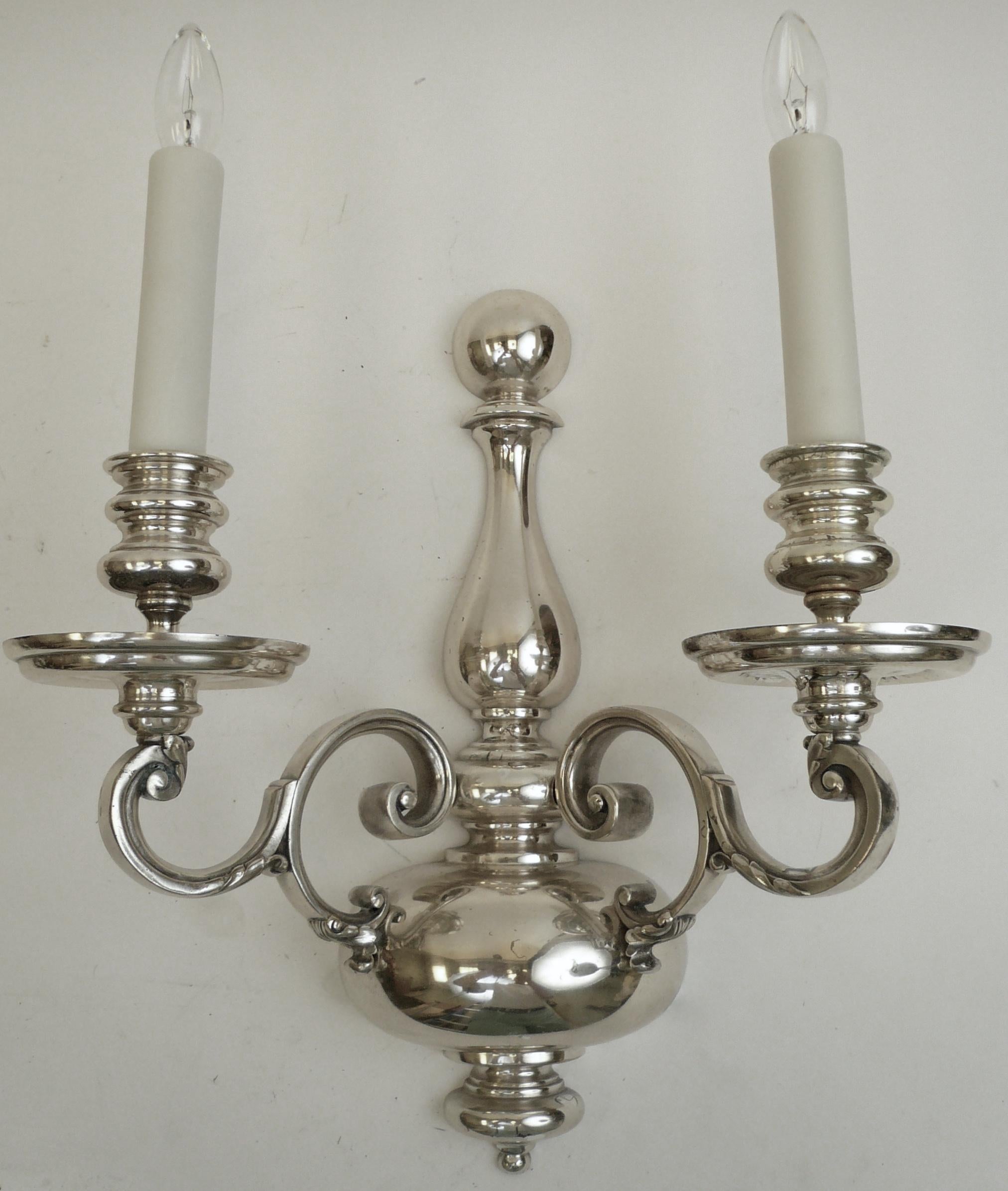This handsome pair of Caldwell sconces are well proportioned, and beautifully cast.