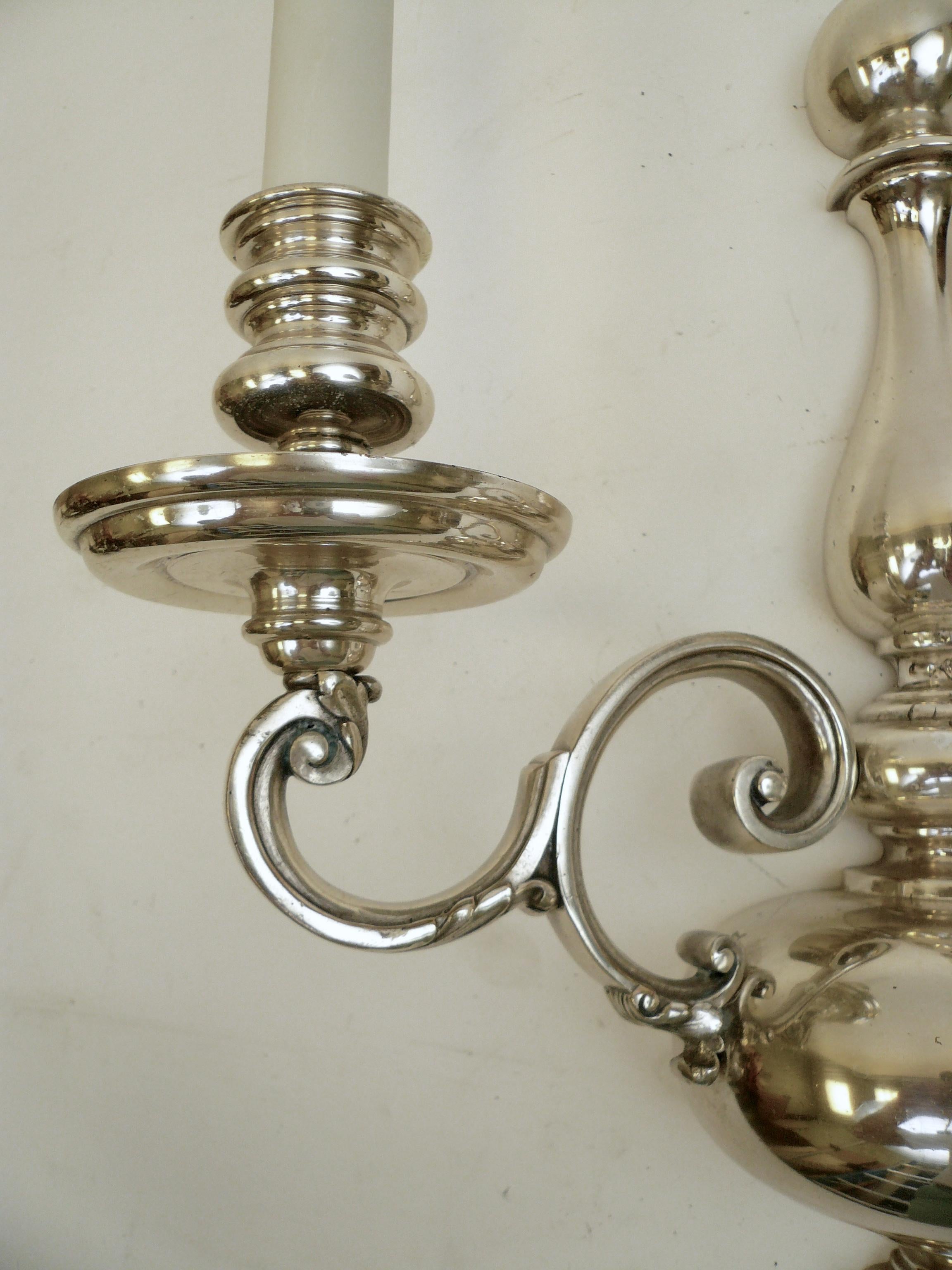 American Pair of Signed E. F. Caldwell Georgian Style Silver Two-Light Sconces