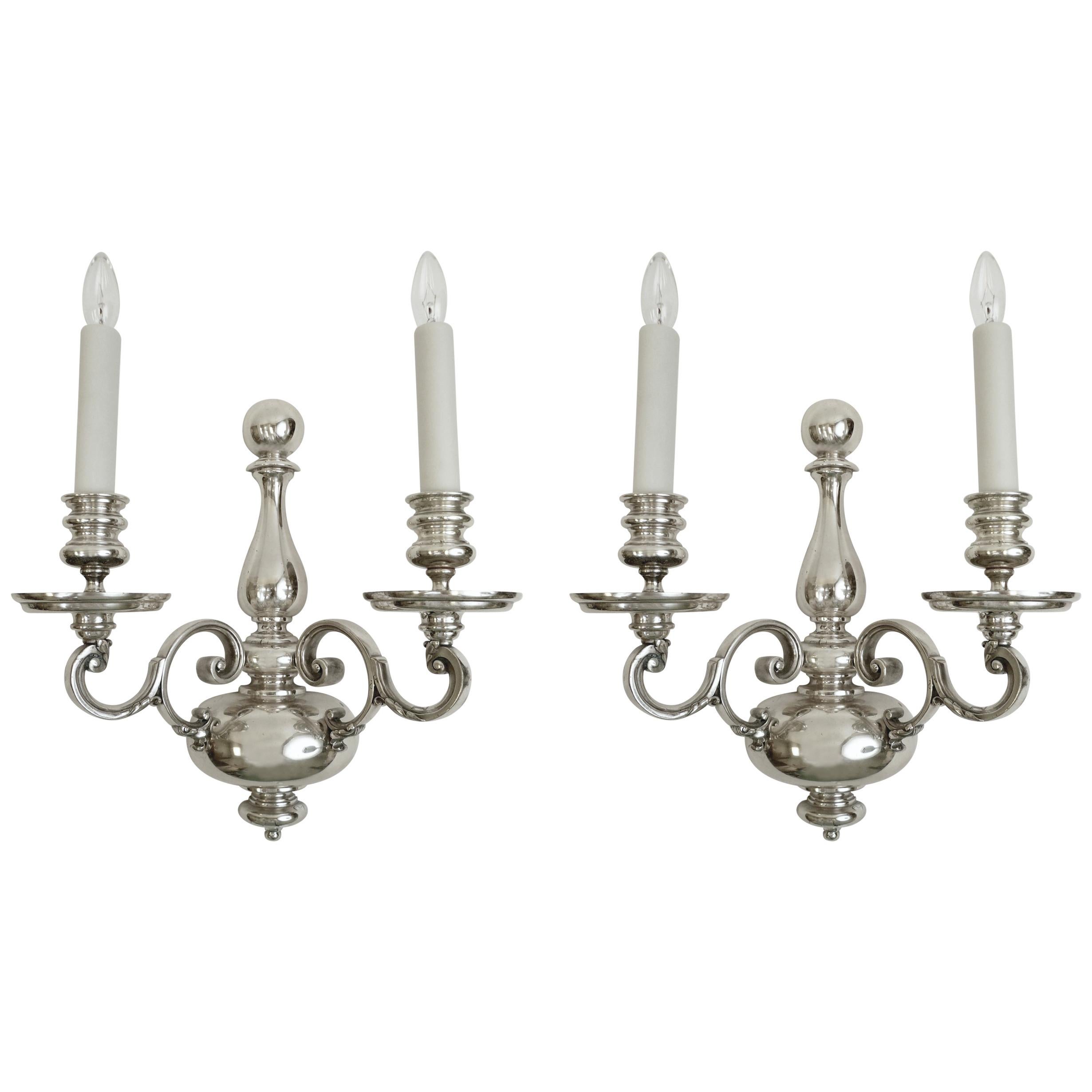 Pair of Signed E. F. Caldwell Georgian Style Silver Two-Light Sconces