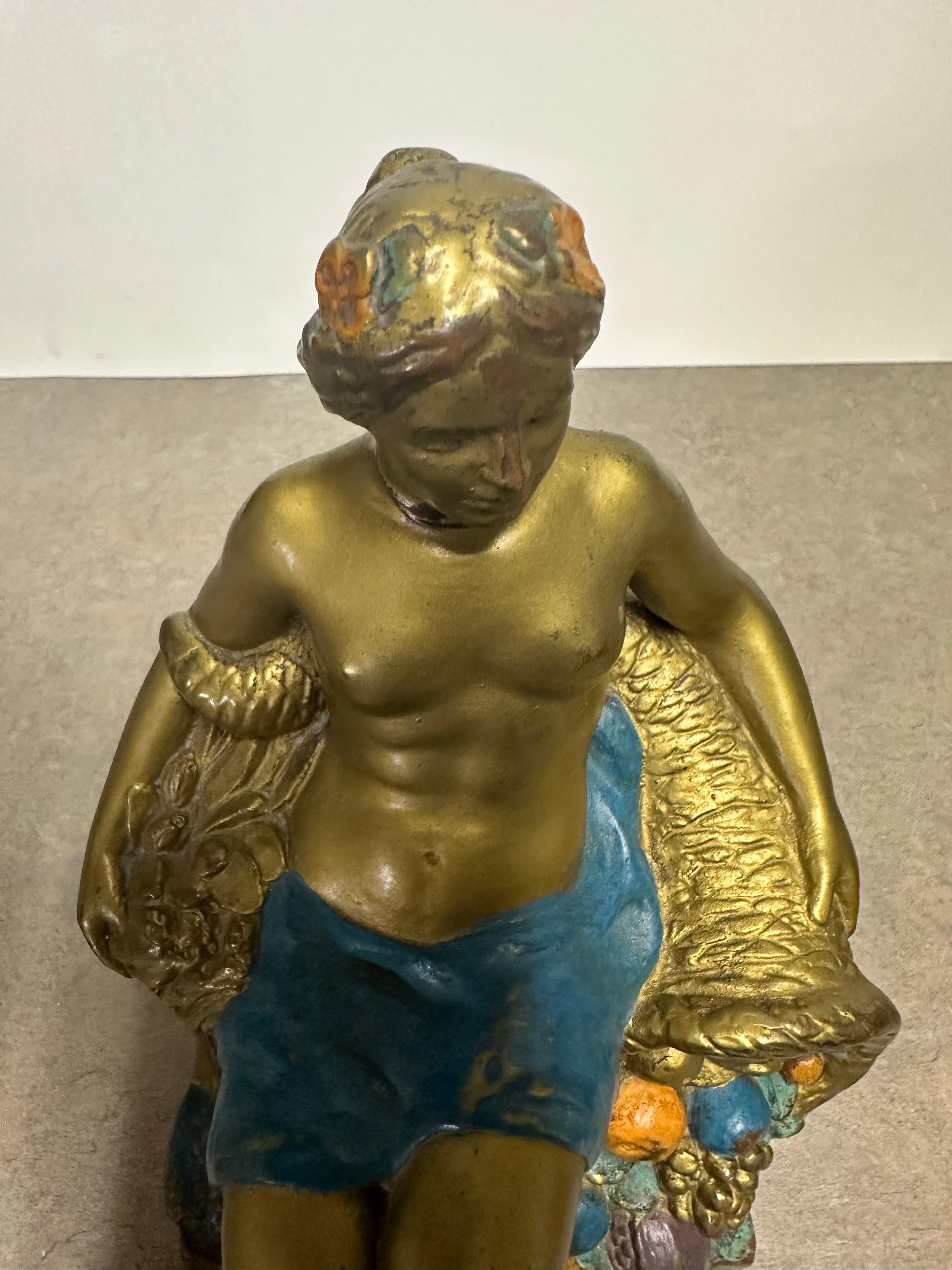 Coppia di fermalibri firmati 