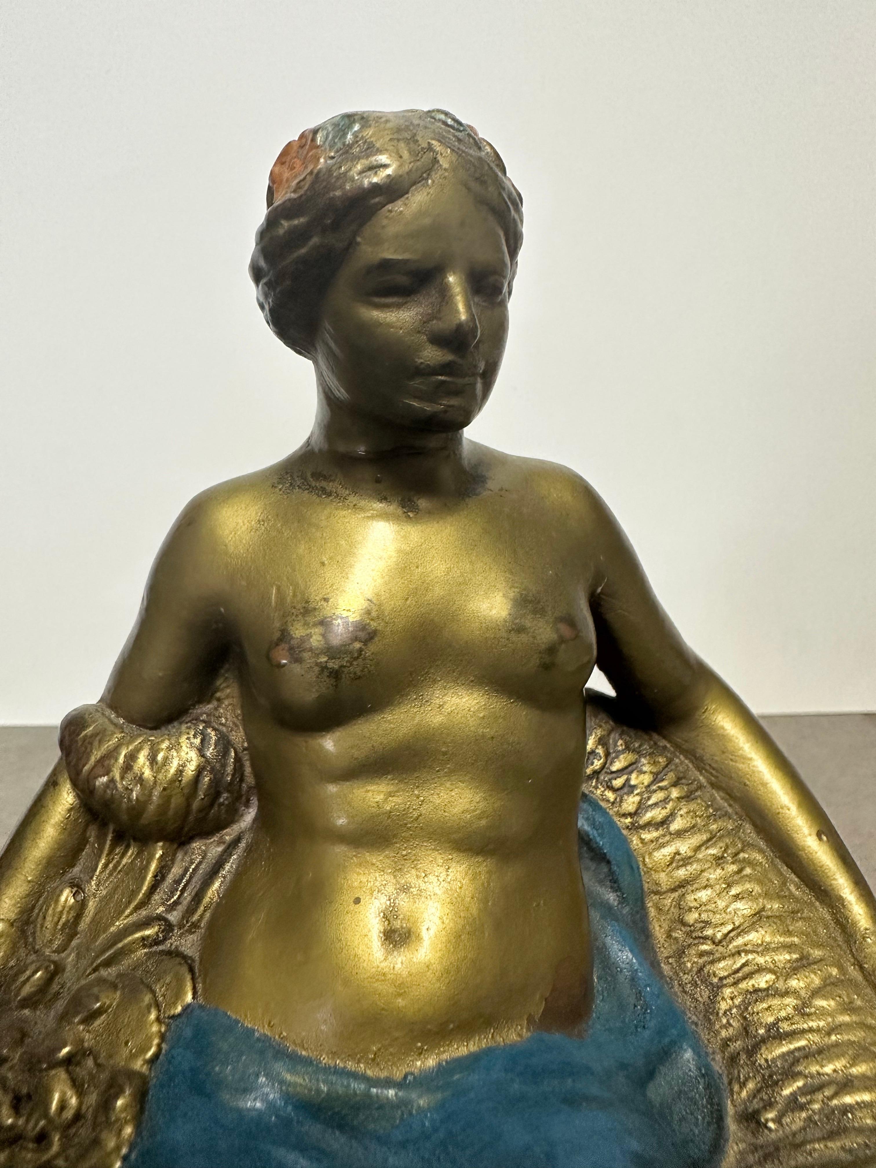 Coppia di fermalibri firmati 