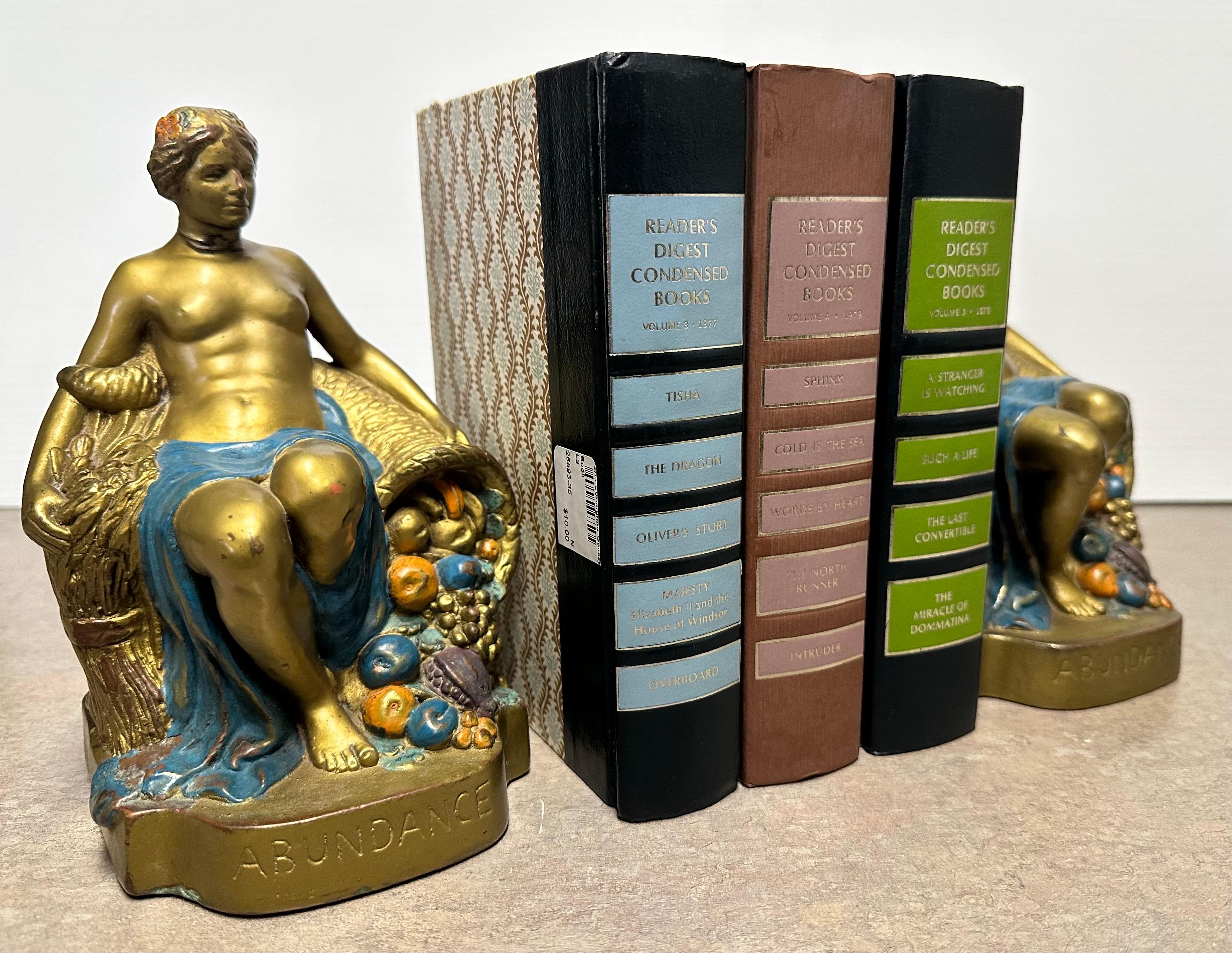 Coppia di fermalibri firmati 