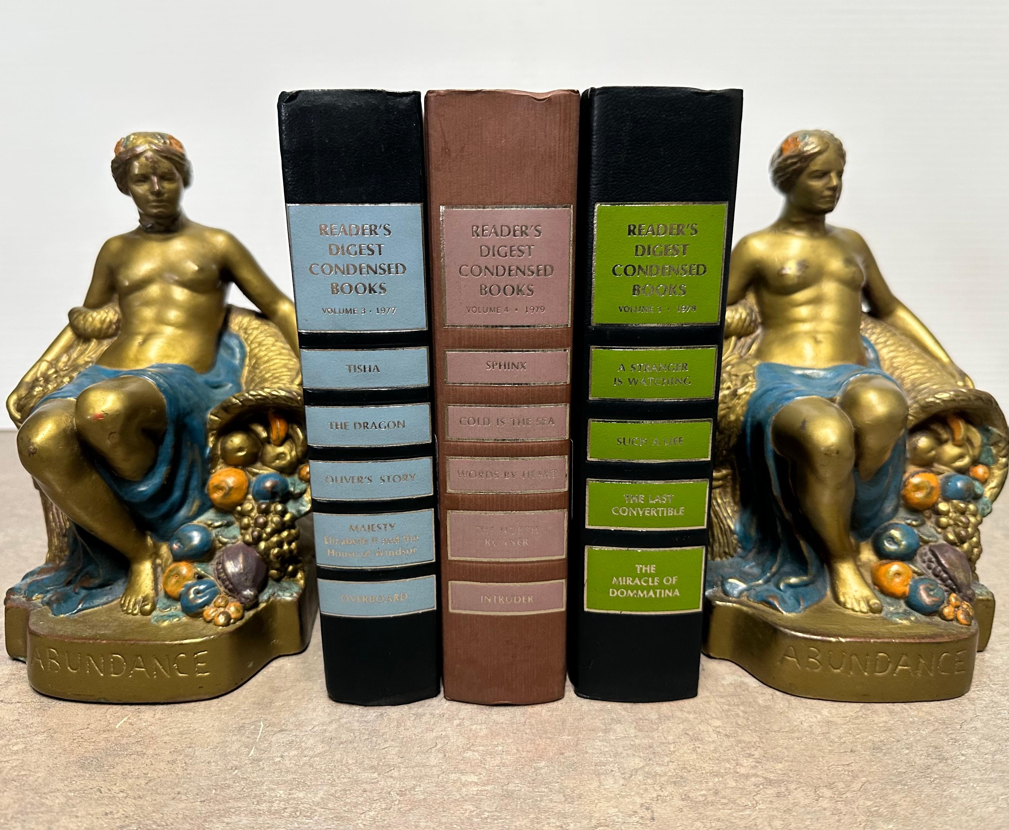 Coppia di fermalibri firmati 