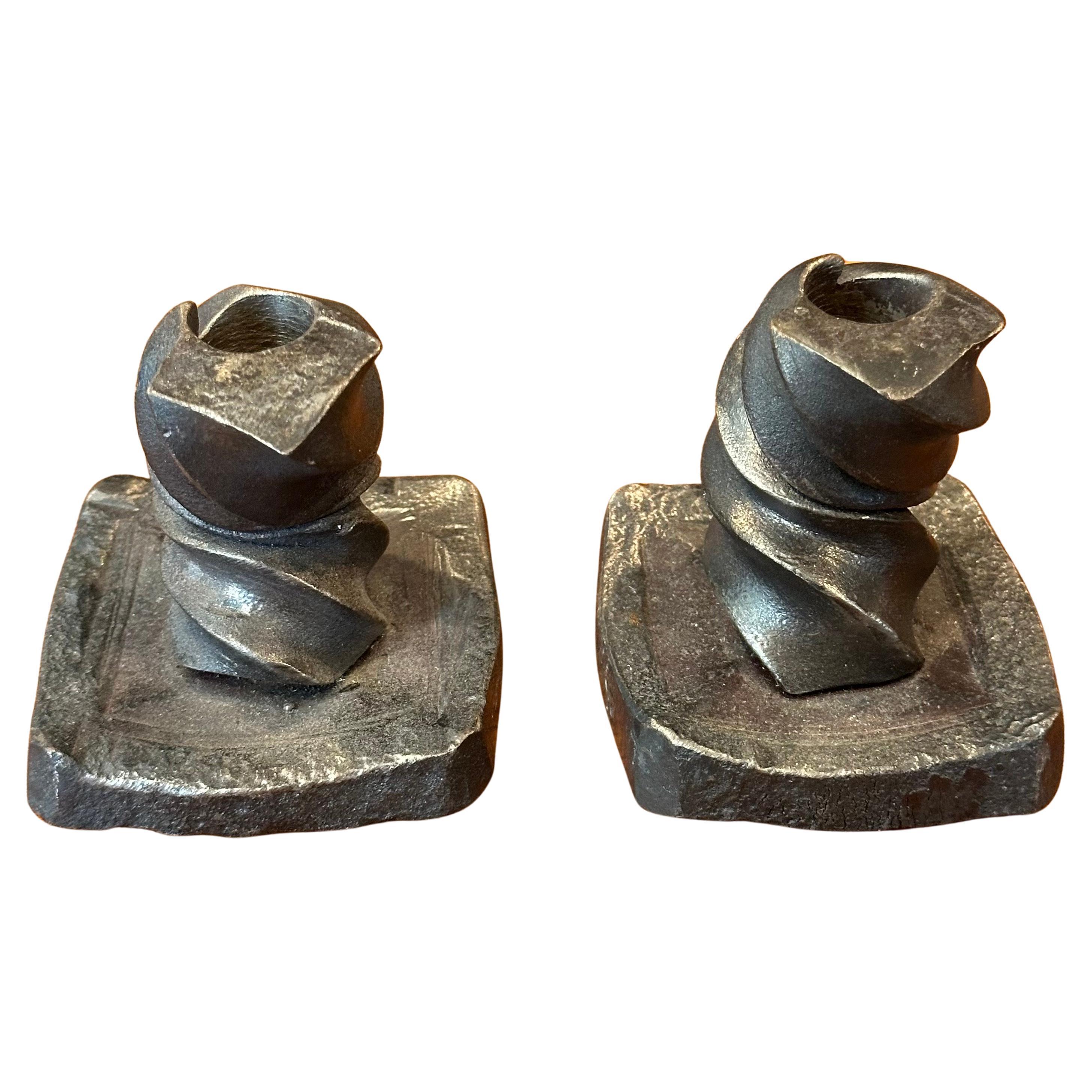 A very nice pair of signed iron brutalist candle holders, circa 1970s. The set is signed on the base 