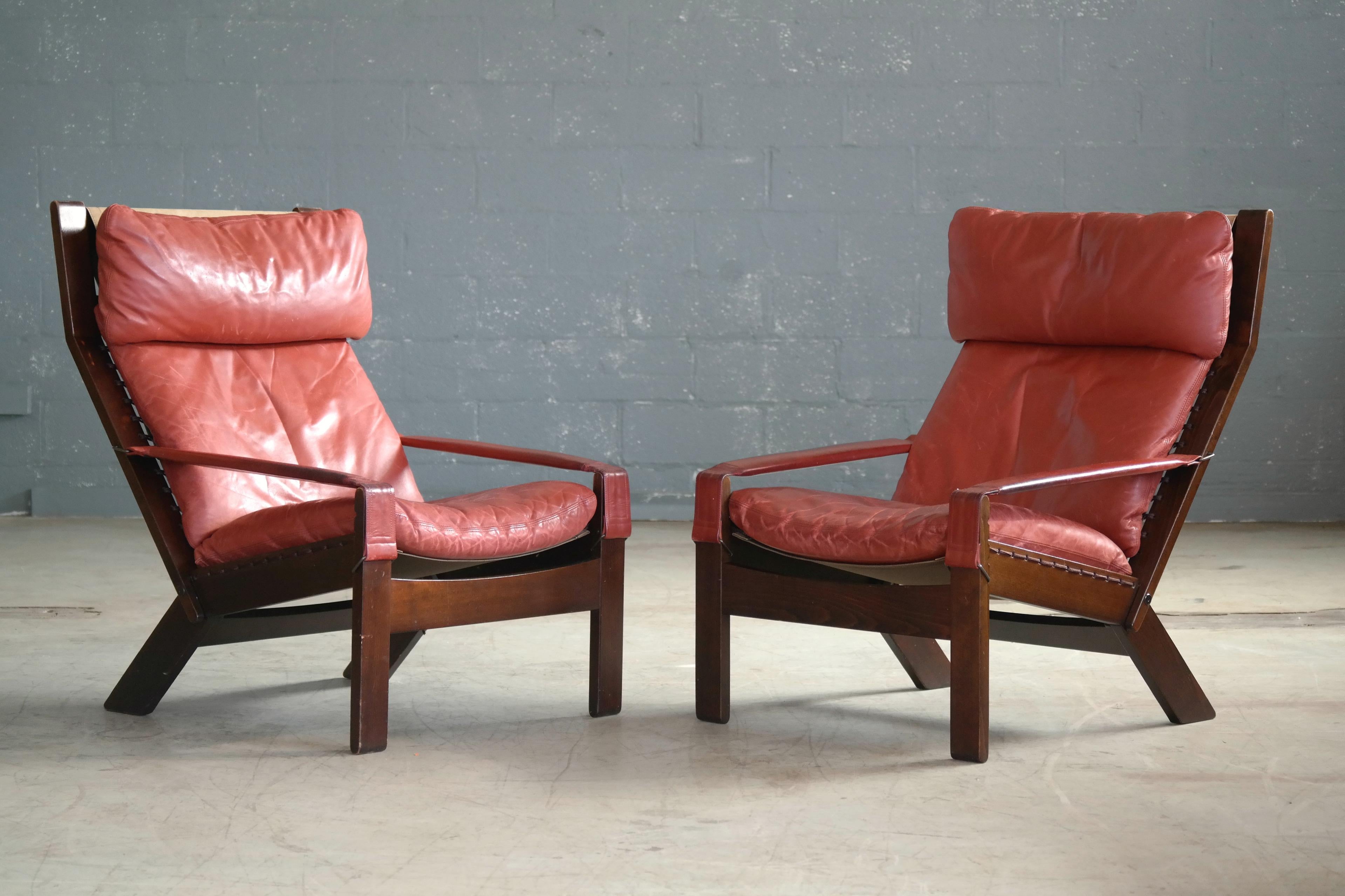 Great pair of reclining lounge chairs designed by Sigurd Ressell for the Norwegian company Westnofa in 1969 and relatives of Ressell's more famous Falcon and Siesta chairs. If anything these chairs probably deserves as much recognition as they