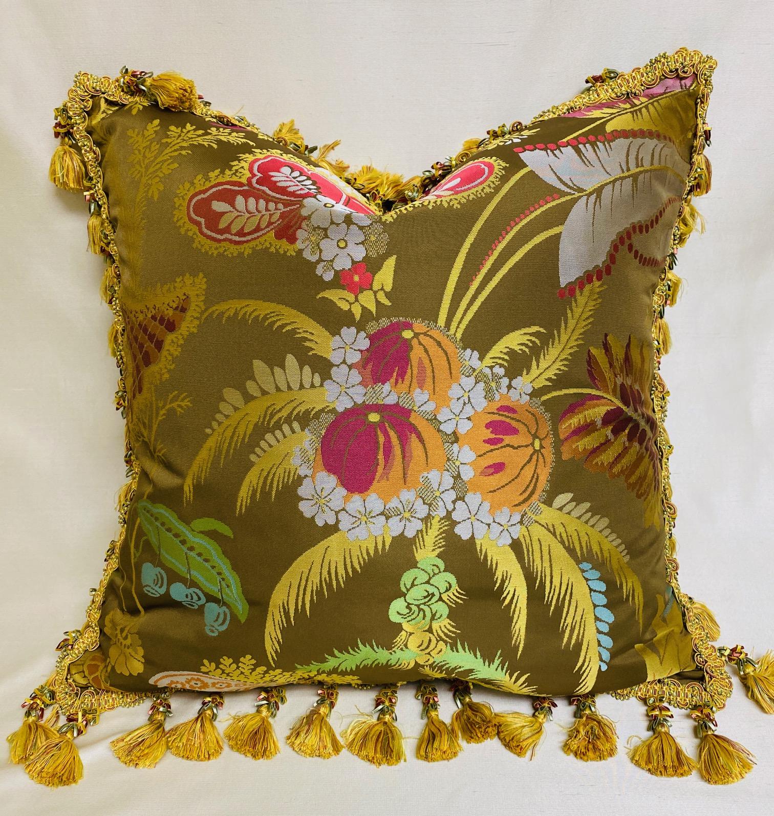 Fine and highly decorative pair of silk brocade cushions multicolored on taupe background with silk tassel fringe.
24