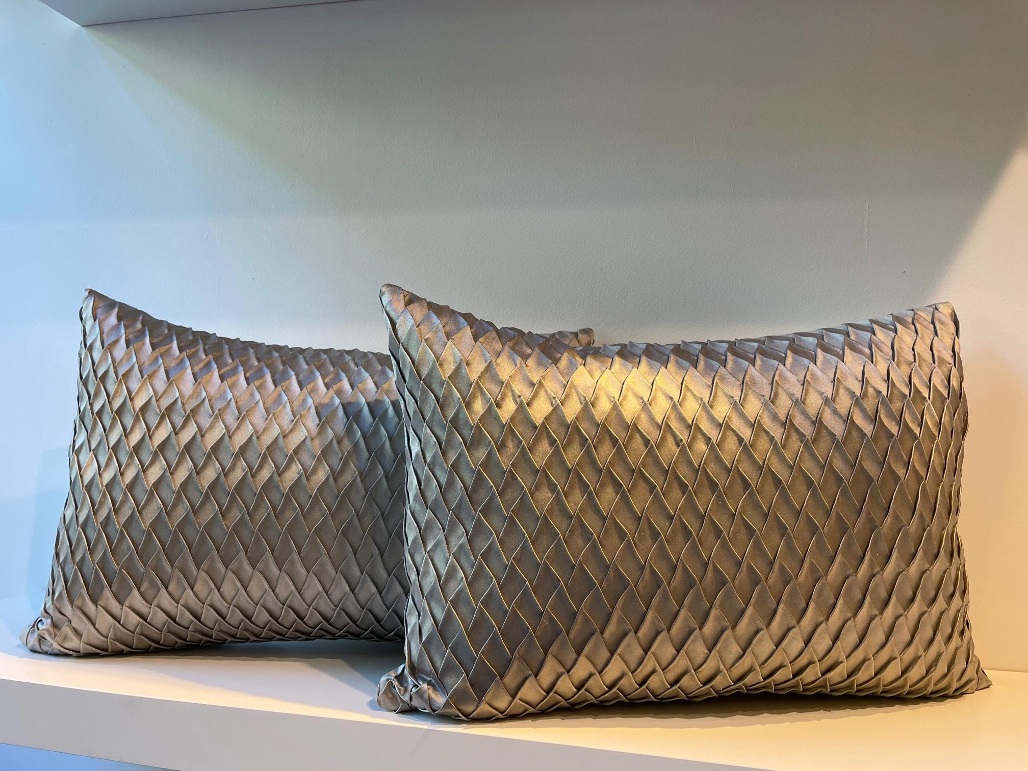 One pair silk cushions with embossed front panel in steam pleated Taffeta silk , fish scale pattern, back panel plain silk, handwoven silk Taffeta col. White Gold, size 35 x 50cm,
cushion cover with concealed zipper in the bottom seam,
inner pad