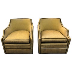 Pair of Silk Hollywood Regency Swivel Chairs