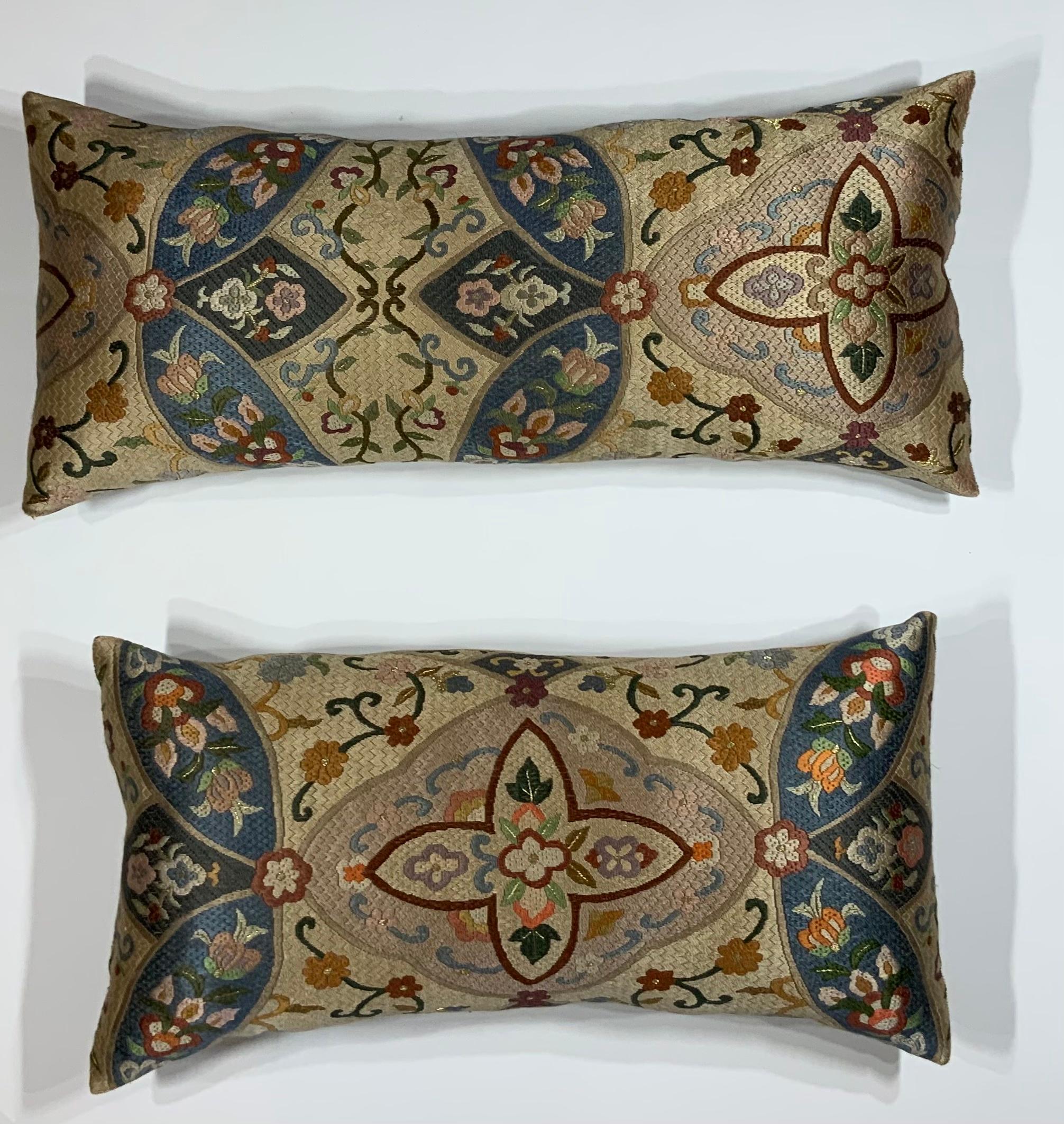 Pair of beautiful pillows made of silk, exceptional motifs of circling vines and flowers, soft colors. Fresh new inserts.
Sizes: 23”.5 x 10”.5. 20” x 10”.5.