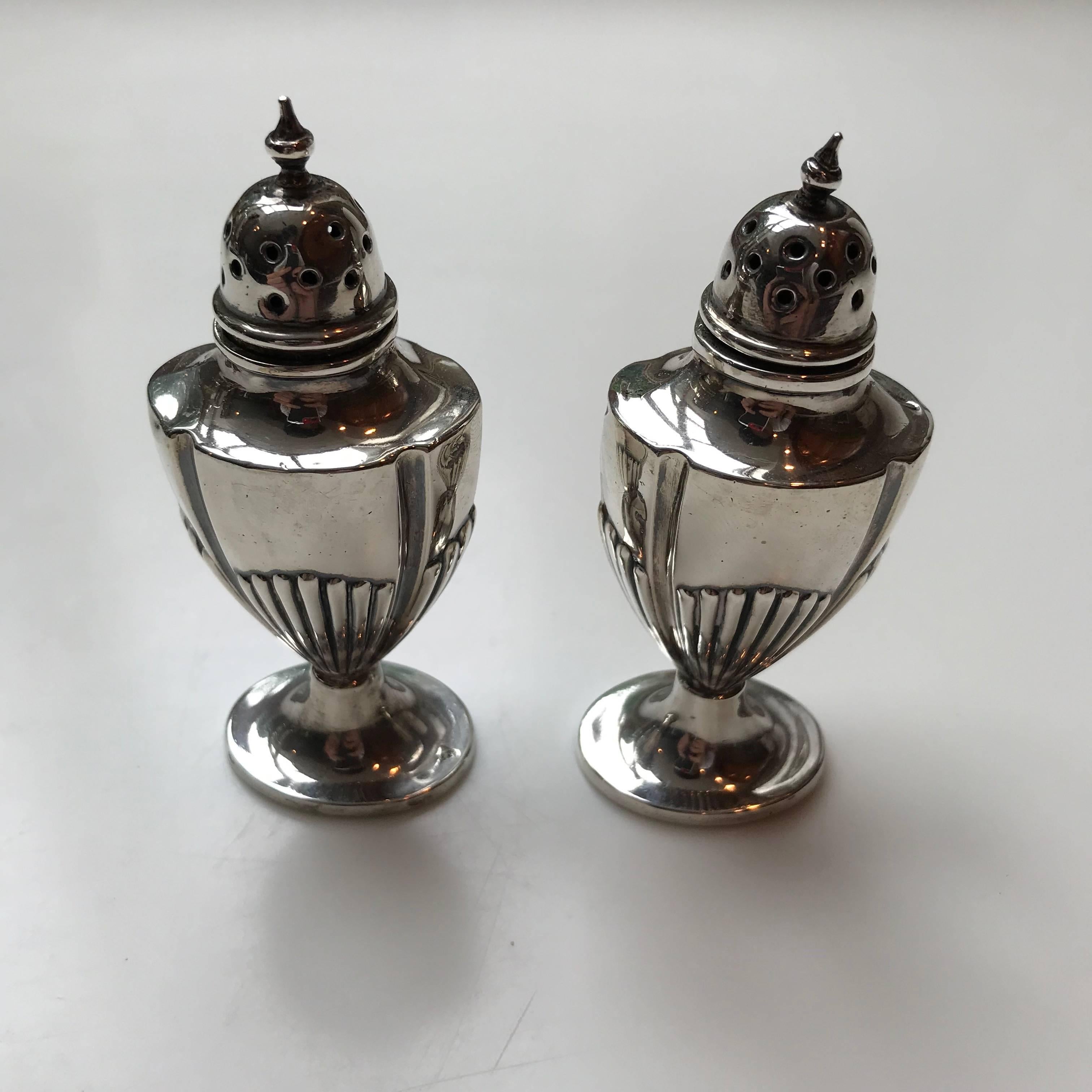 Pair of silver Adam style Pepperettes by Birmingham.