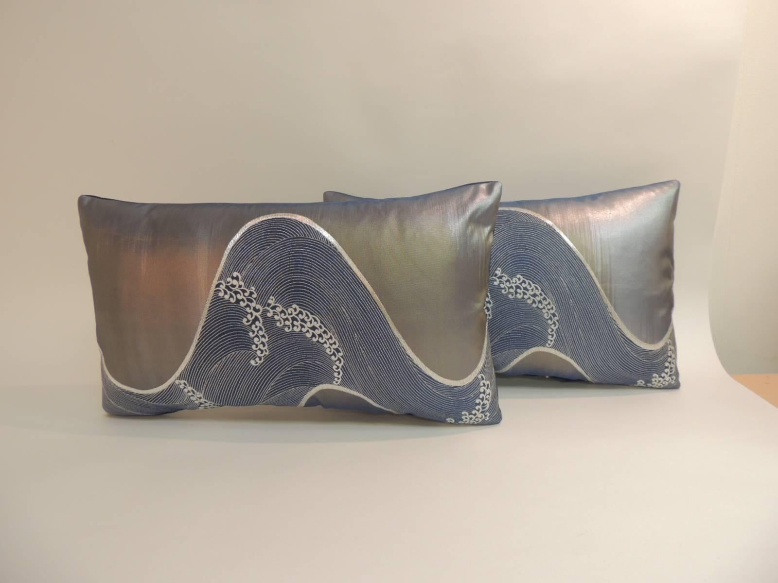 Decorative vintage obi pillows in shades of blue and gray silk embroidery obi textiles.
Decorative pillow motifs are silver metallic threads embroidered on indigo color vintage silk
Decorative pillows motif consists of gray metallic threads