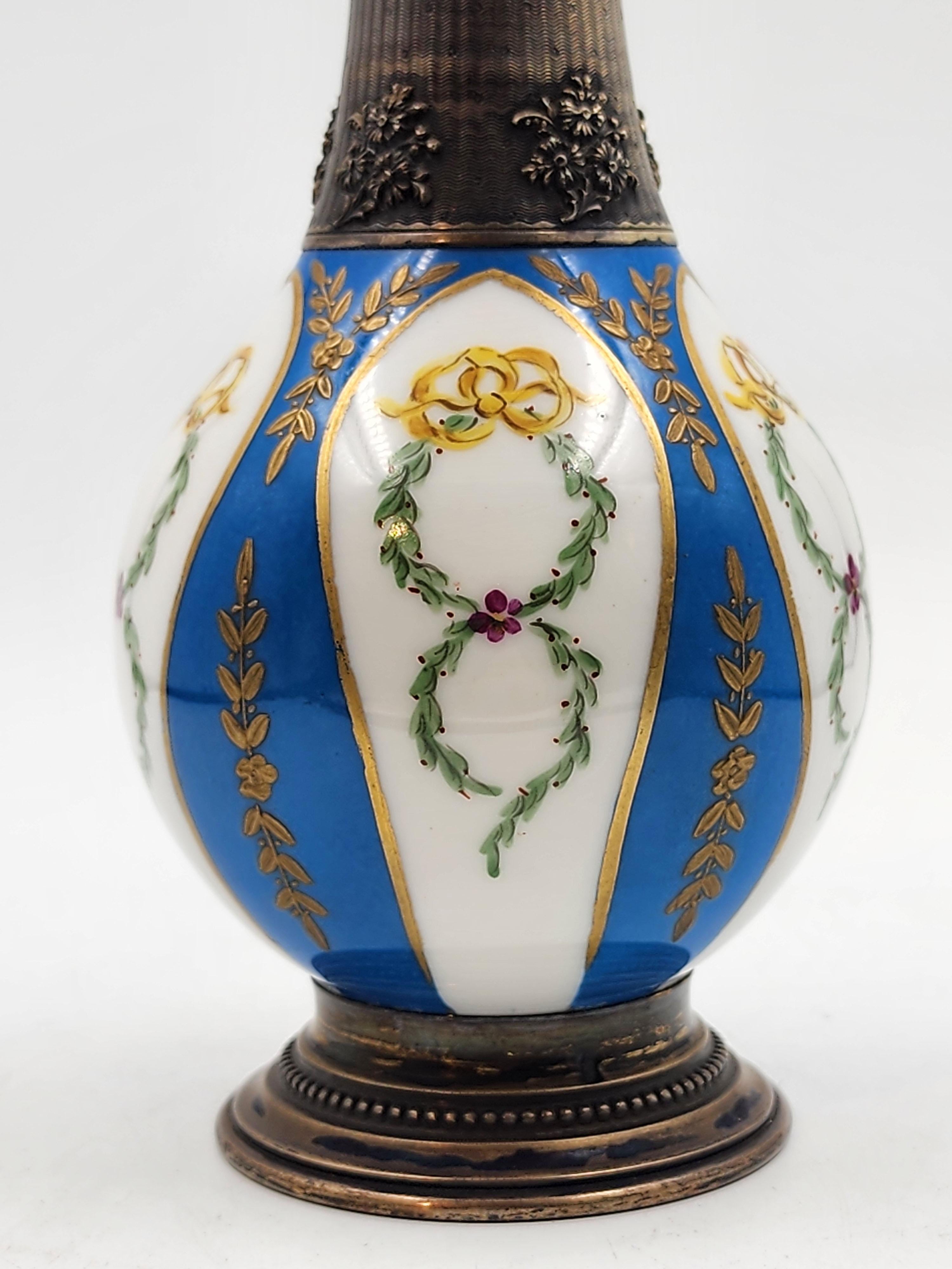 French Pair of silver and porcelain sevres vases, 19th century For Sale