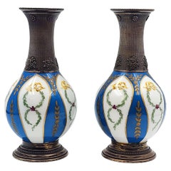 Pair of silver and porcelain sevres vases, 19th century