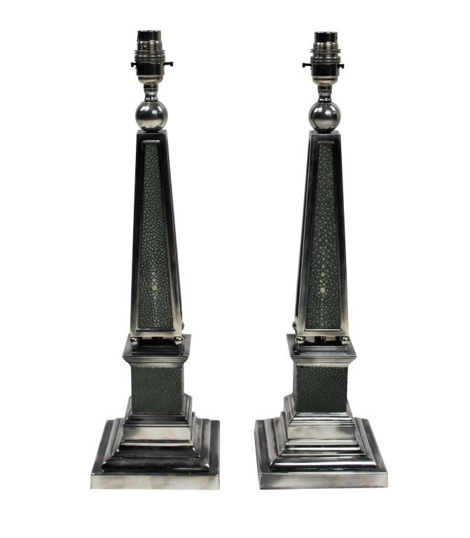 A pair of English silver plated obelisk lamps covered in antique shagreen.

These lamps are made to order for Ebury Trading.

Subjected to VAT.
  