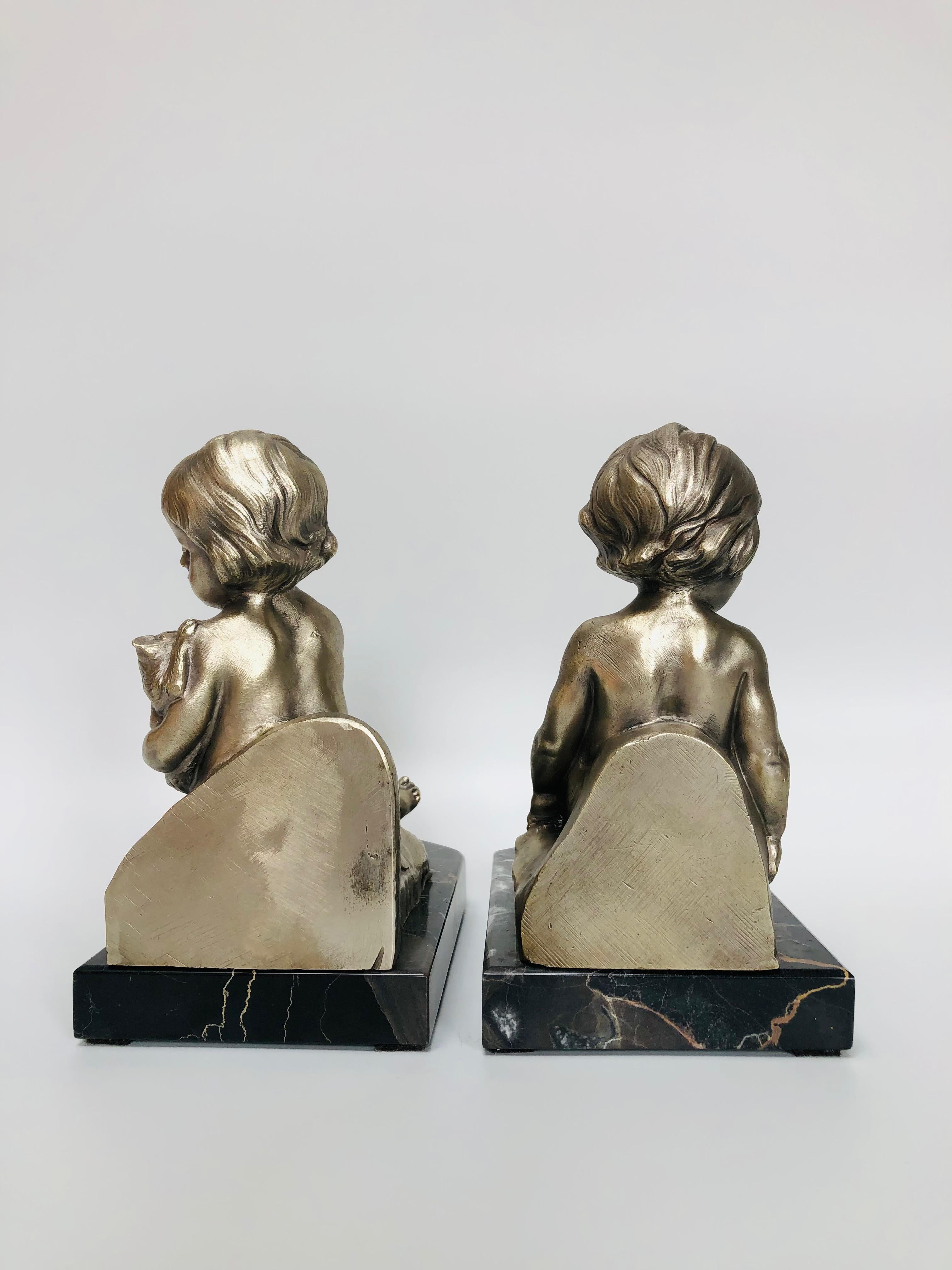 French Pair of Silver Bronze Bookends For Sale