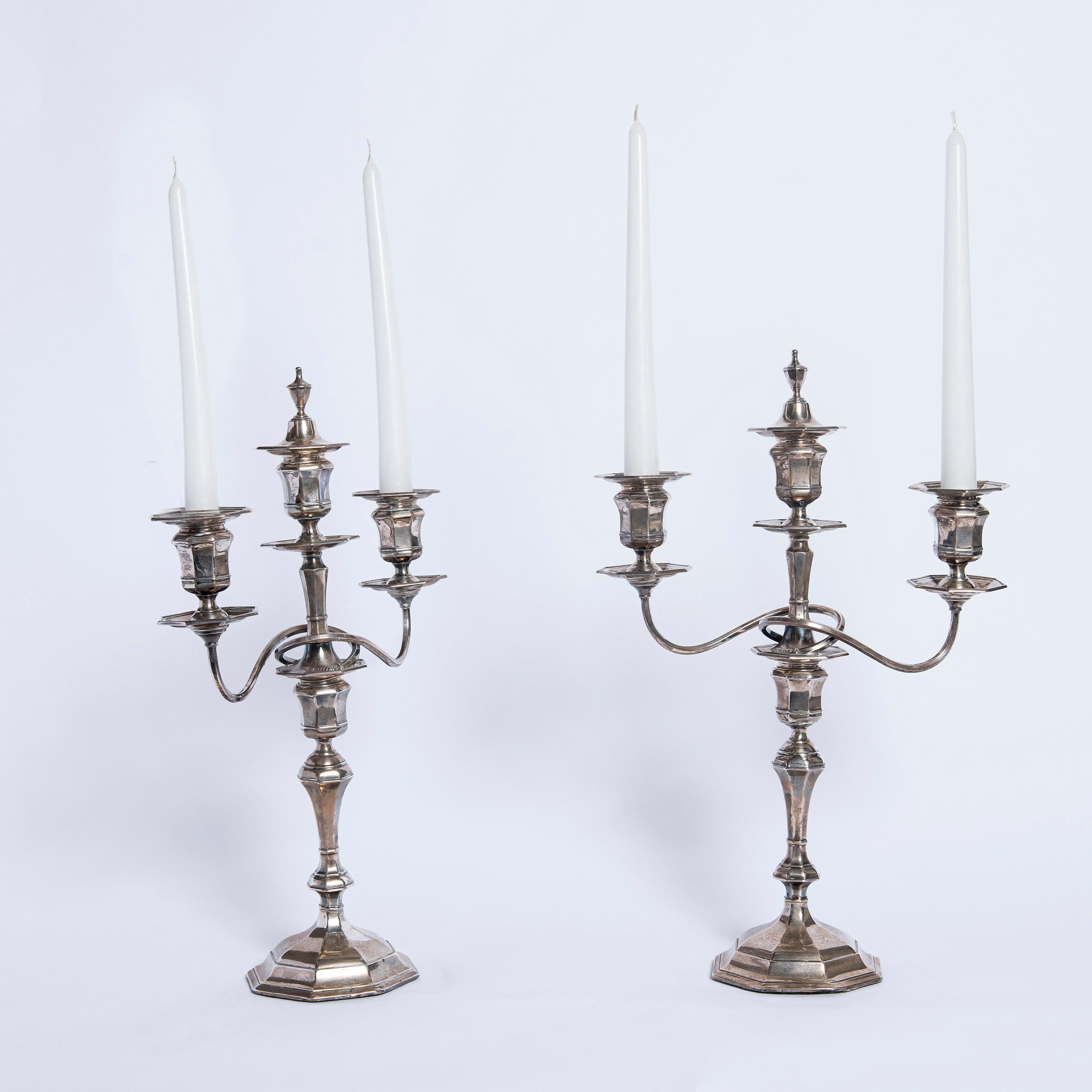 Pair of silver candelabras sealed William Hutton & Sons Ltd., England, 1920.