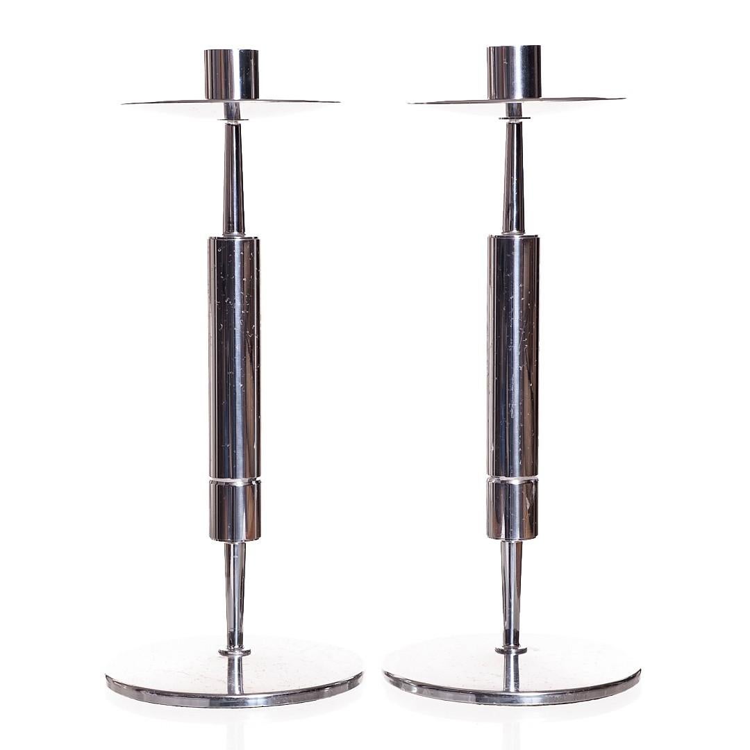 Pair of silver plate candlesticks attributed to Tommi Parzinger for Dorlyn Silversmiths, USA, circa 1950. Unsigned.

Provenance: Originally purchased from Palumbo NYC.