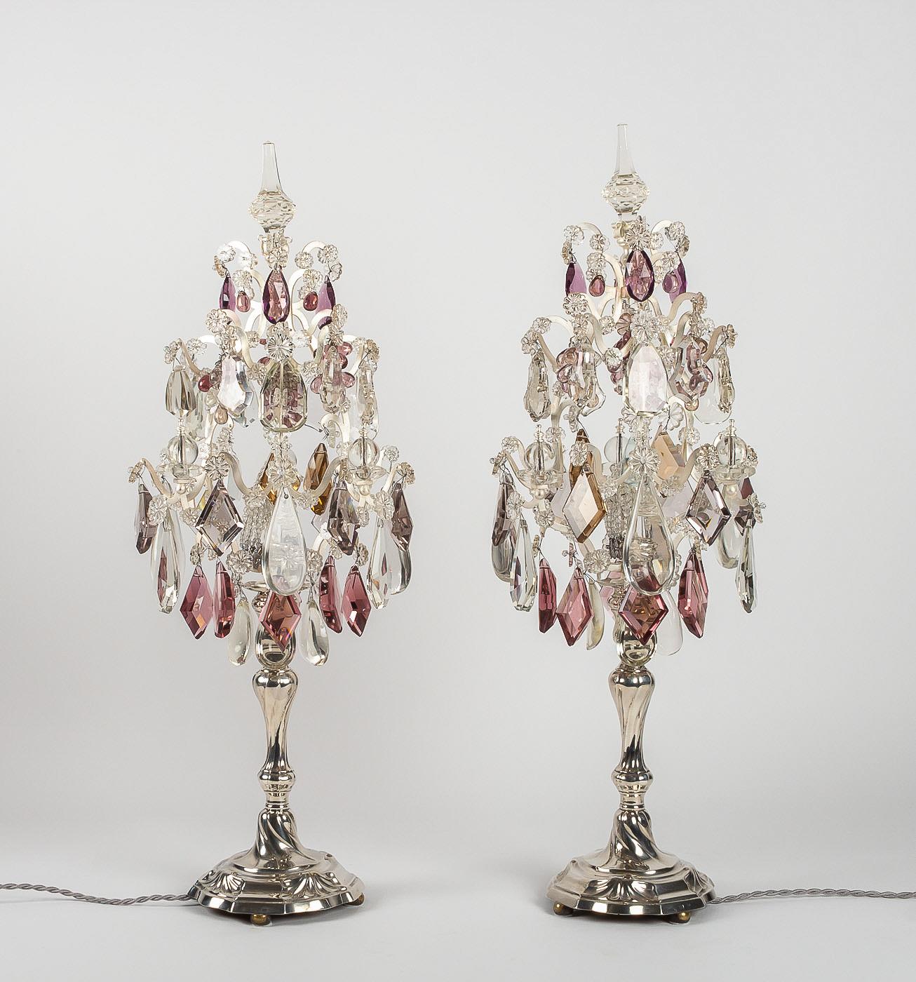 Pair of silver candlesticks converted in Girandole lamps Belgium, circa 1772.

Elegant and decorative pair of silver candlesticks converted in girandole candelabra lamps.
Fine quality cut crystal decoration with white and Amethyst colored crystal