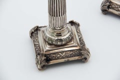 Pair of silver candlesticks in the shape of Greek columns