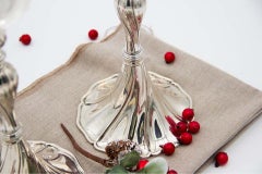 Pair of silver candlesticks with spiral trim and removable stems