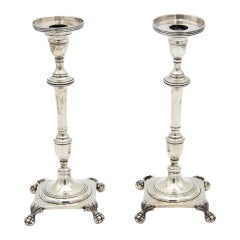 Pair of silver candlesticks with square bases