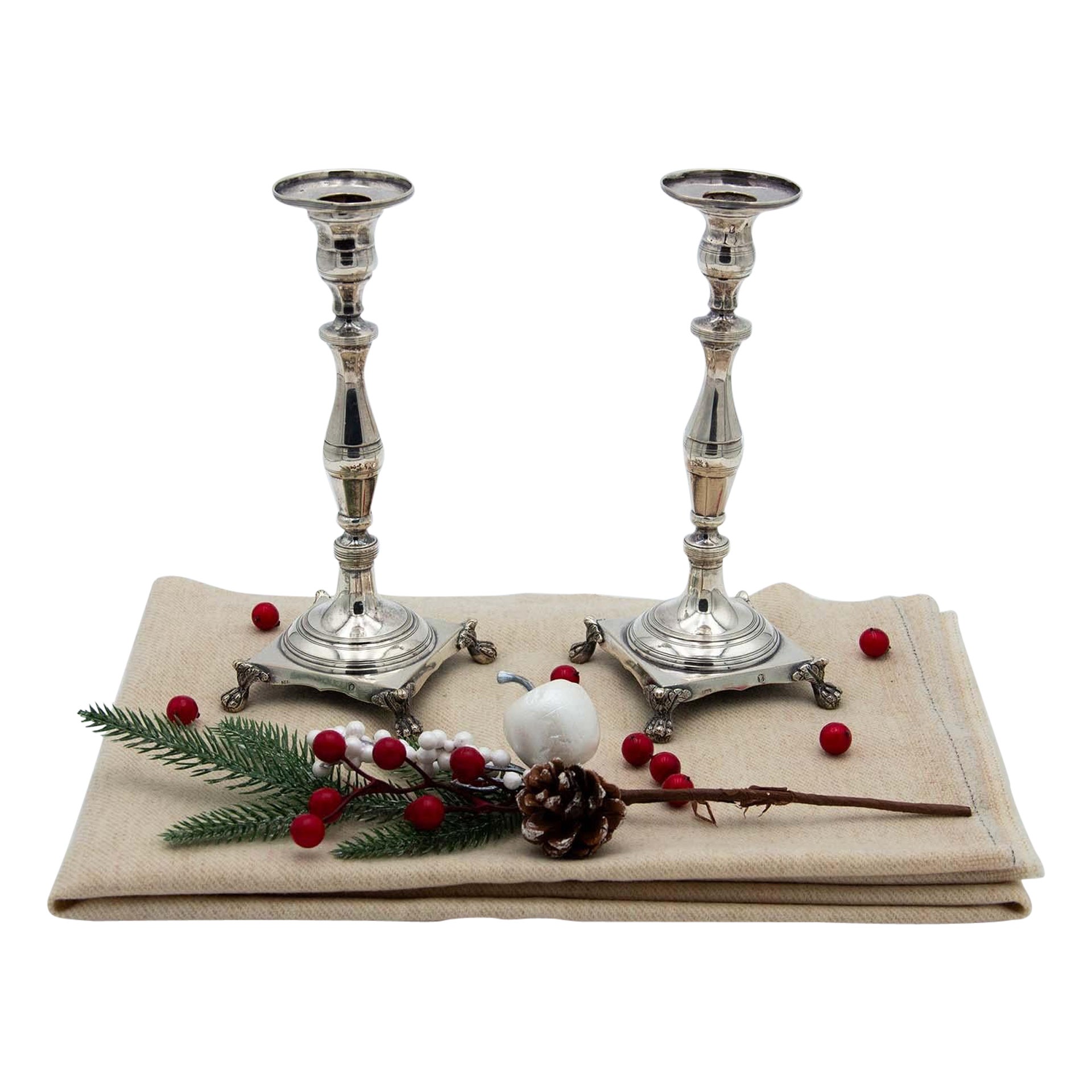 Pair of silver candlesticks with turned stems, beaded sconces, claw feet For Sale