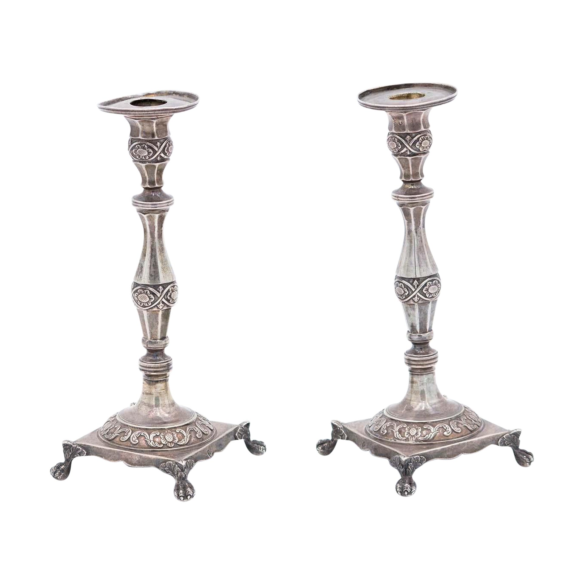 Pair of silver candlesticks with turned stems